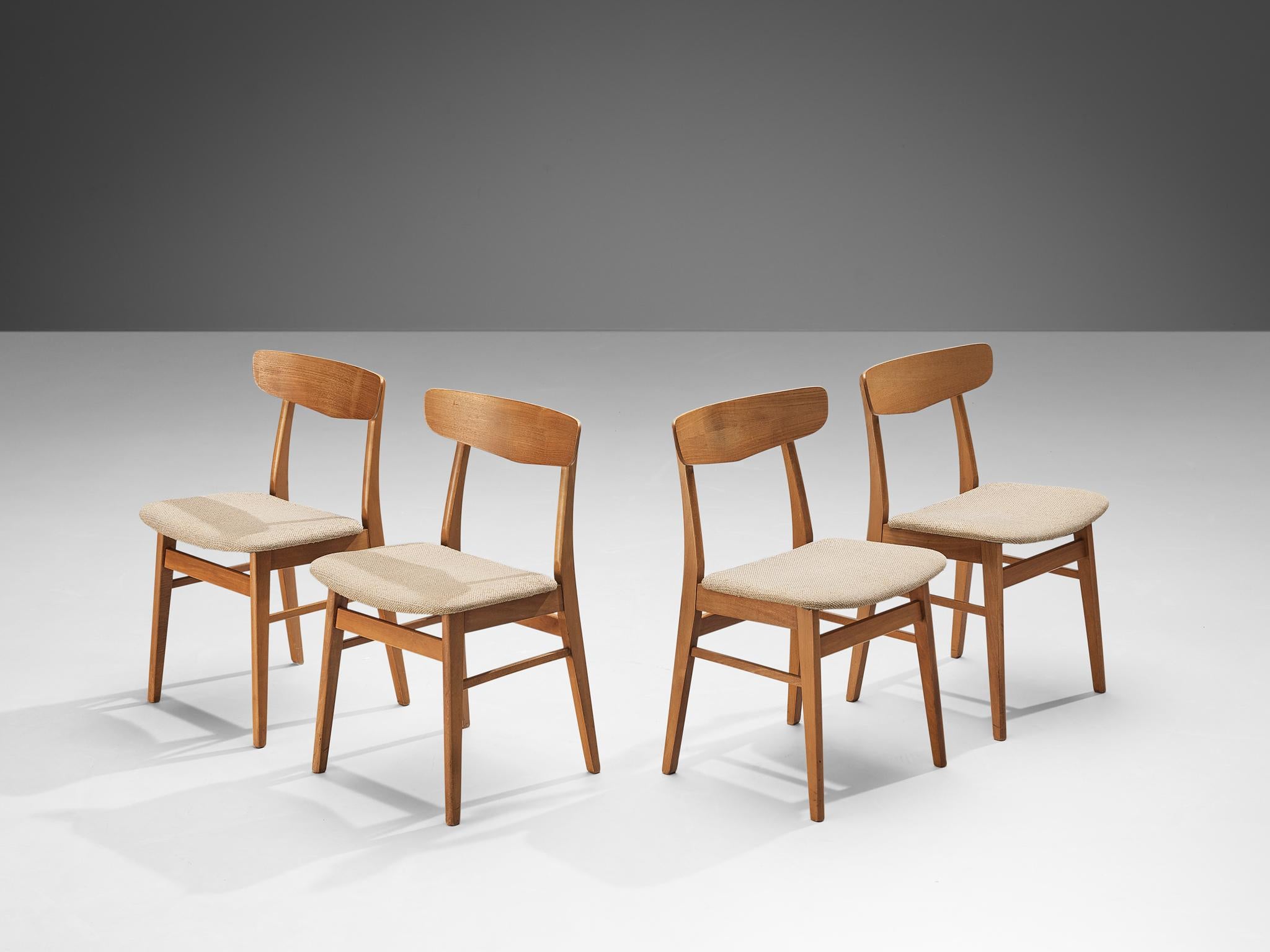 Dining chairs, teak, beech, fabric, Denmark, 1960s

These Danish dining chairs display a convincing aesthetic typical of the 1960s Danish furniture style, reminiscent of the work of Hans J. Wegner. The design is well-proportioned and balanced,
