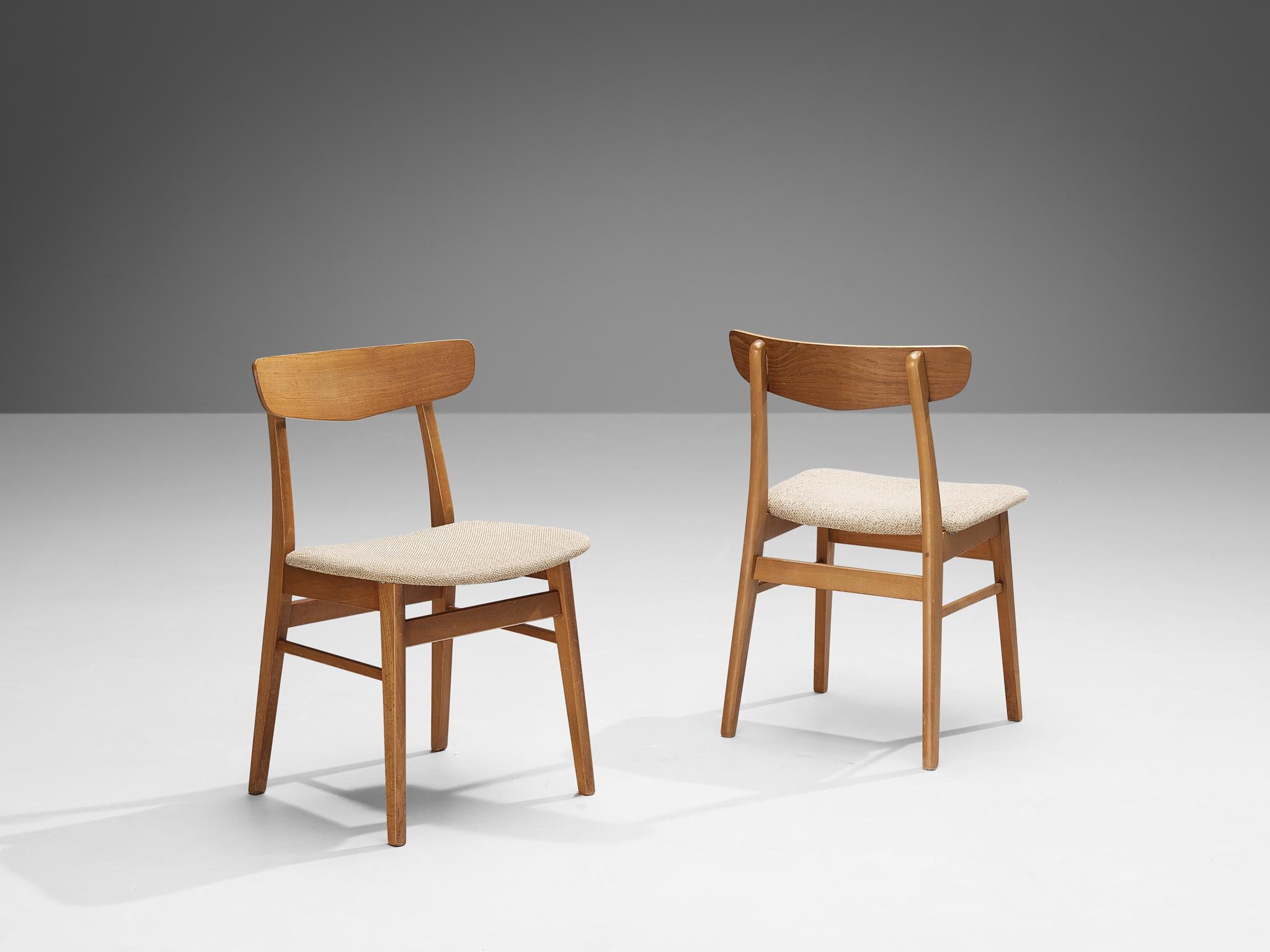 Dining chairs, teak, beech, fabric, Denmark, 1960s

These Danish dining chairs display a convincing aesthetic typical of the 1960s Danish furniture style, reminiscent of the work of Hans J. Wegner. The design is well-proportioned and balanced,