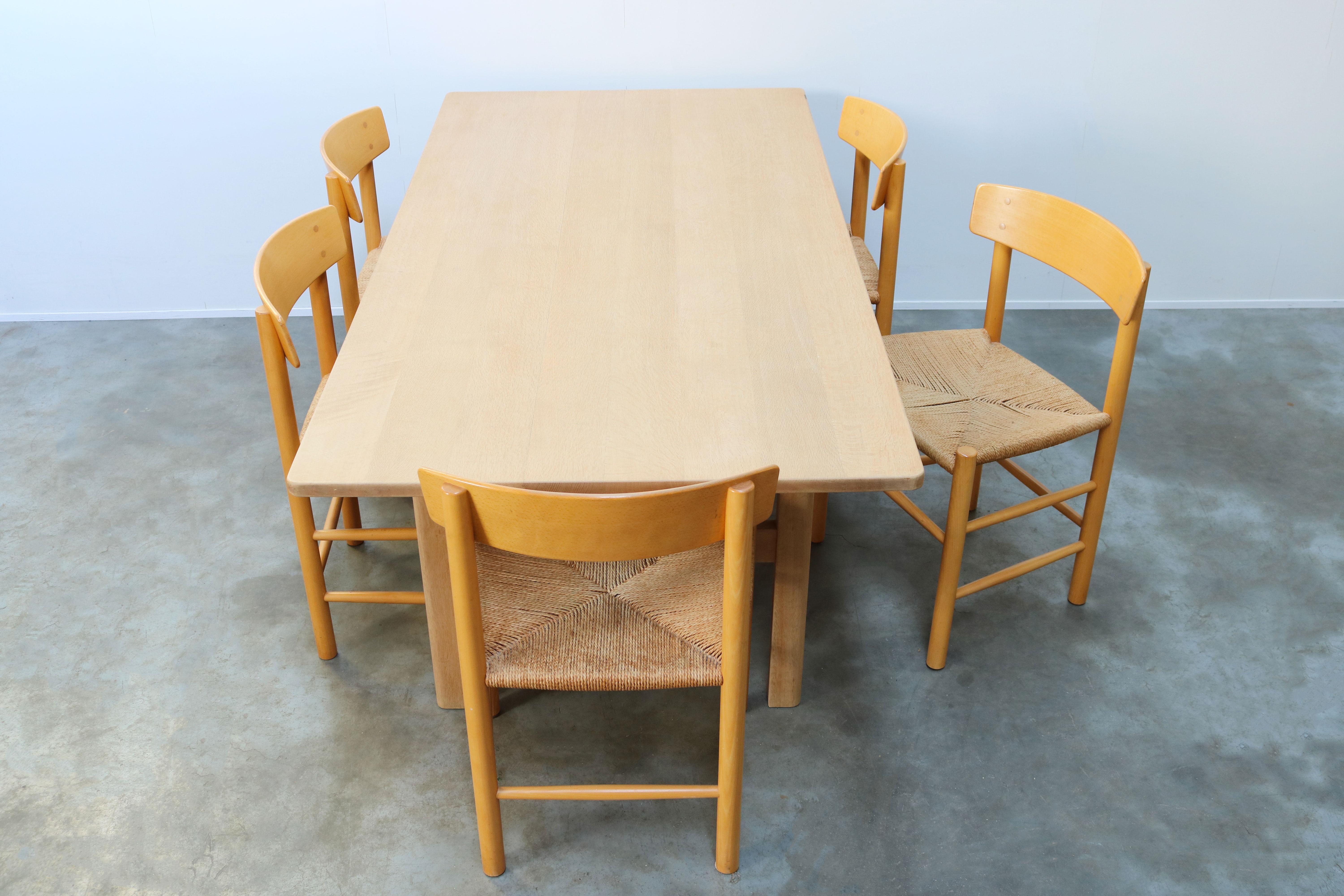 Rare Danish dining set by Borge Mogensen for Fredericia in the 1950s wonderful clean Shaker styled design. The set consist of five J39 chairs also referred to as ''The Peoples Chair'' with papercord and a matching rare model: 6284 Shaker table in