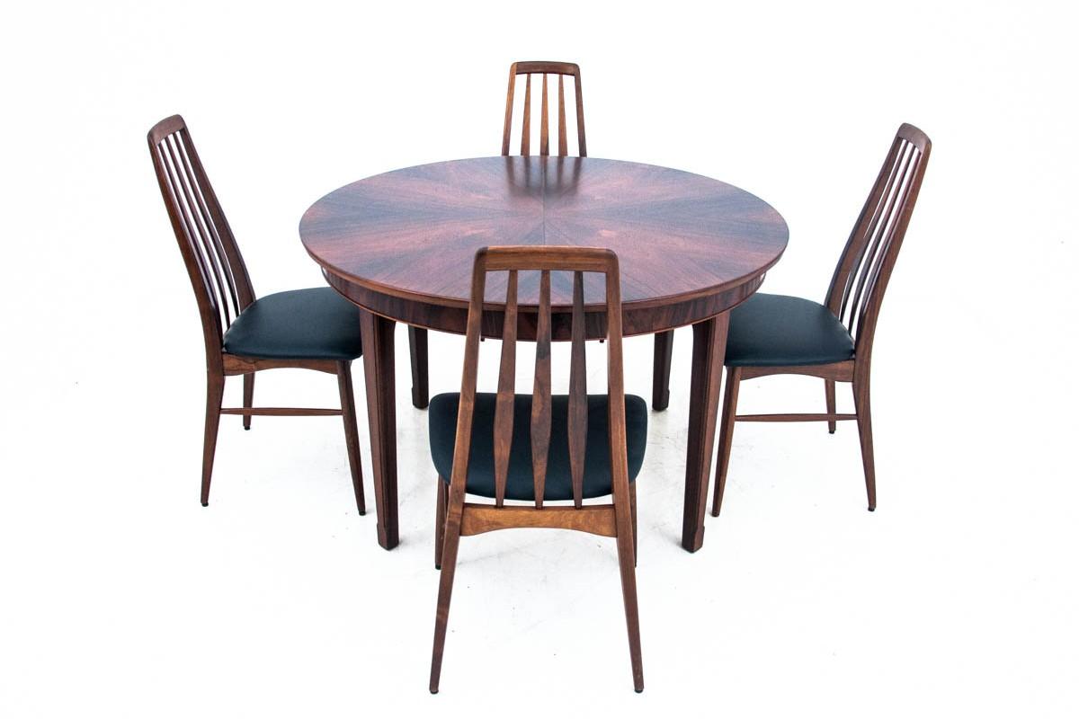 The rosewood table with chairs comes from Denmark from the 1960s. 
Beautiful chairs by Niels Koefoed.
Table with rosewood beautiful graining.
Furniture in very good condition, professionally renovated. The chairs are upholstered with new natural