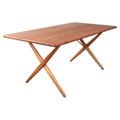 Danish dining table in solid teak and beech and brass, model AT 303/Hans Wegner.