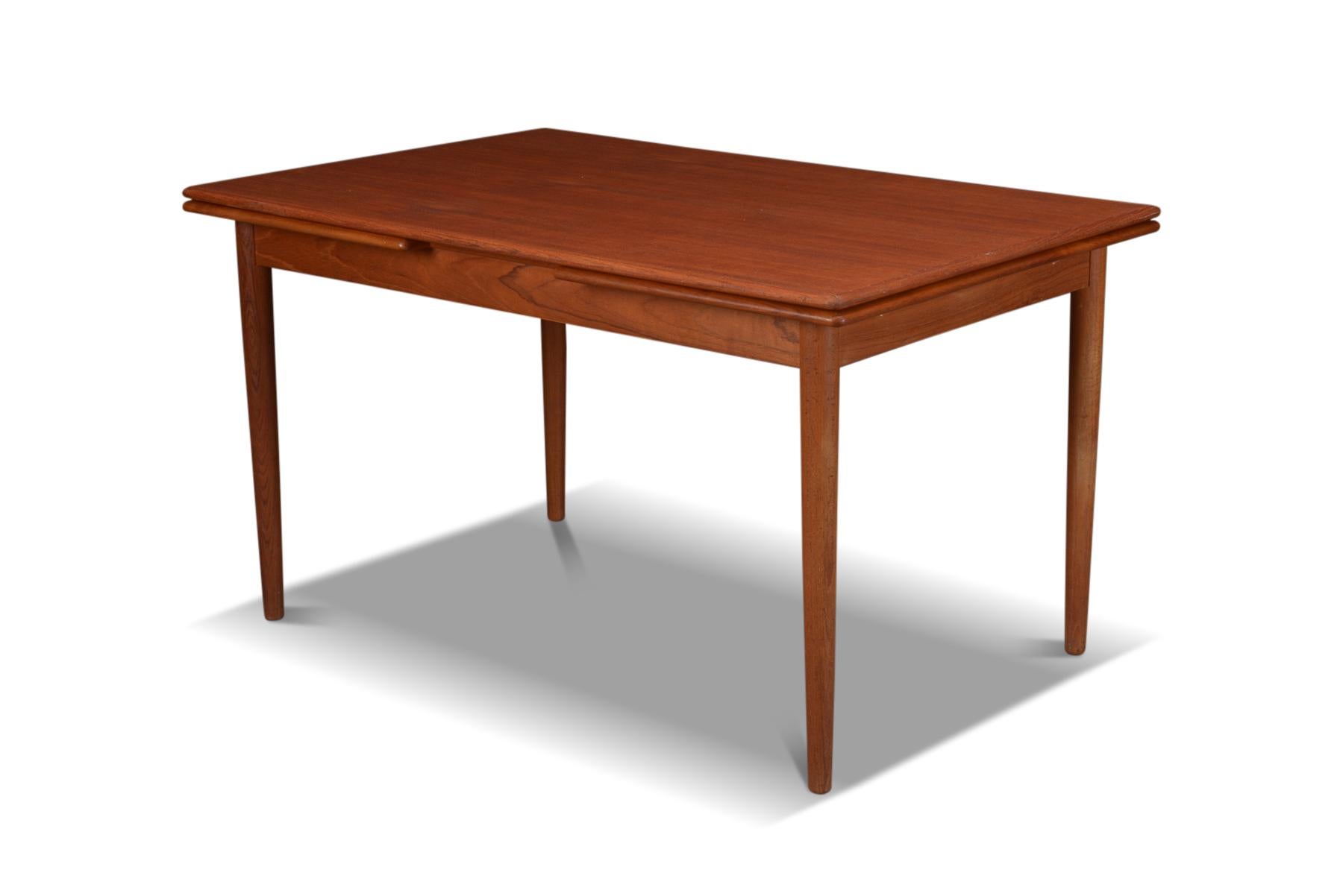 Mid-Century Modern Danish Draw Leaf Dining Table in Teak For Sale