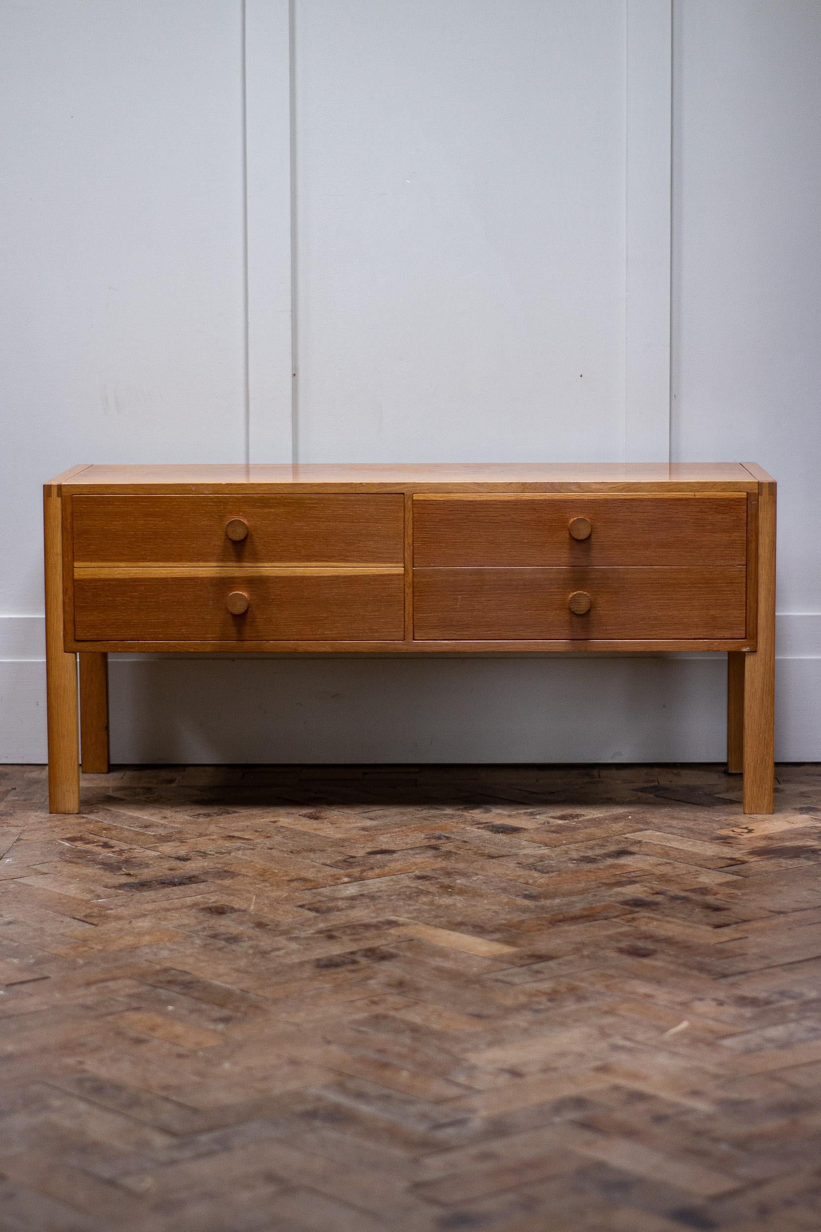 A set of drawers by cabinetmaker Aksel Kjersgaard produced by Odder, Denmark, circa 1960.

The drawers are made of blonde oak and ply lined drawers. There are four drawers to the set all of the same size and the legs can be easily detached for