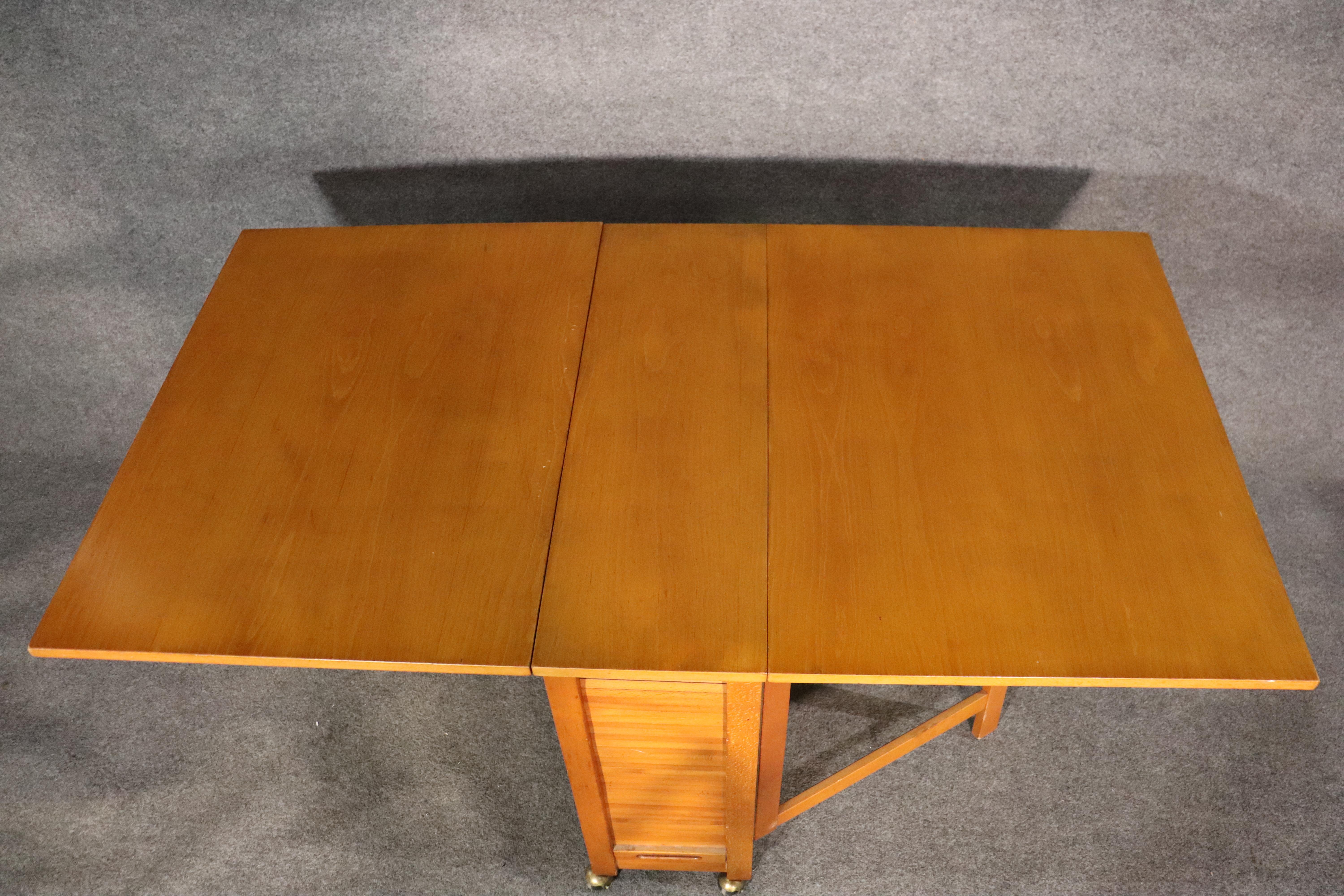 folding dining table with chairs inside