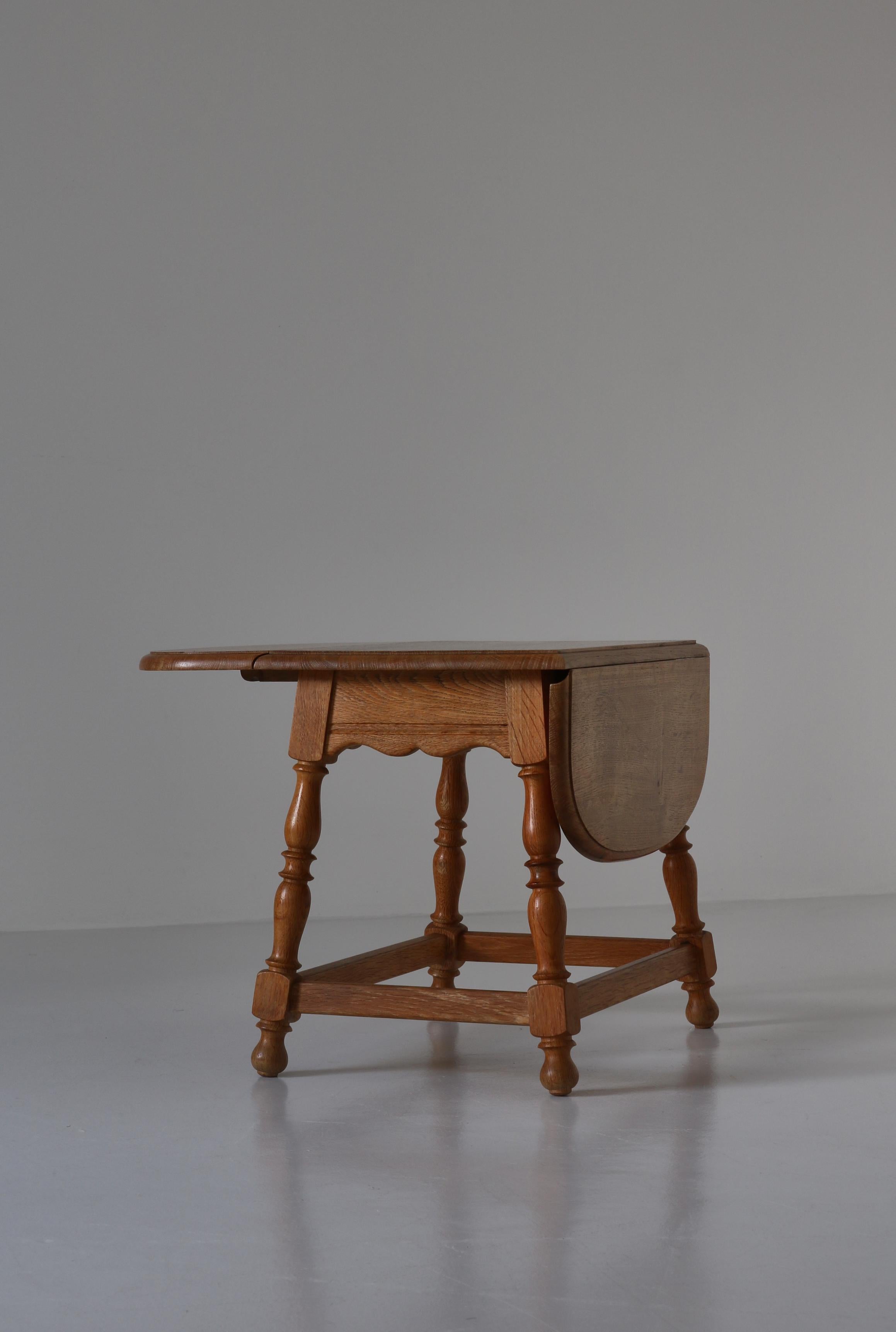 Danish Drop-Leaf Table in Quartersawn Oak by Henry Kjærnulf, 1960s For Sale 7