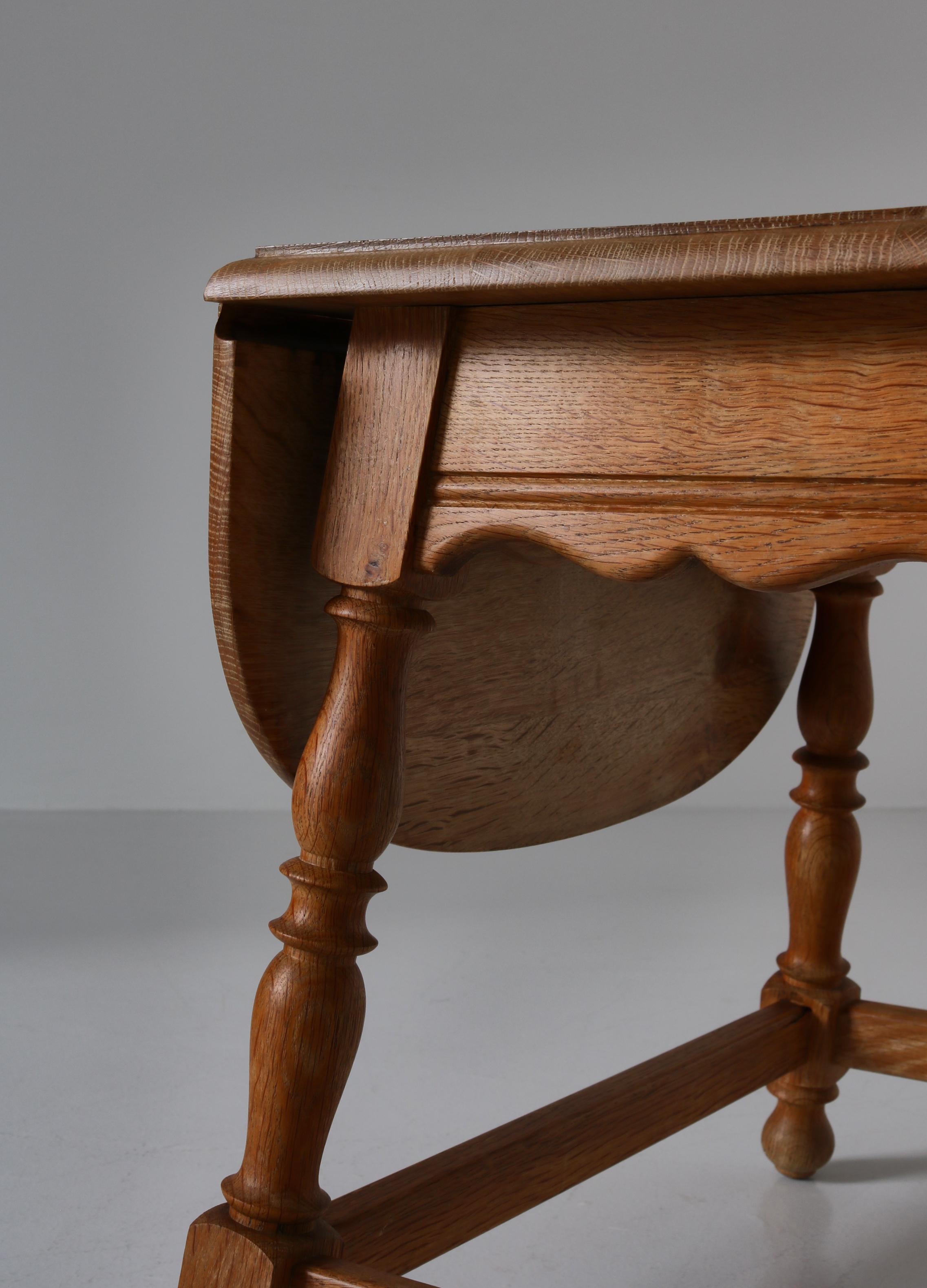 Mid-20th Century Danish Drop-Leaf Table in Quartersawn Oak by Henry Kjærnulf, 1960s For Sale