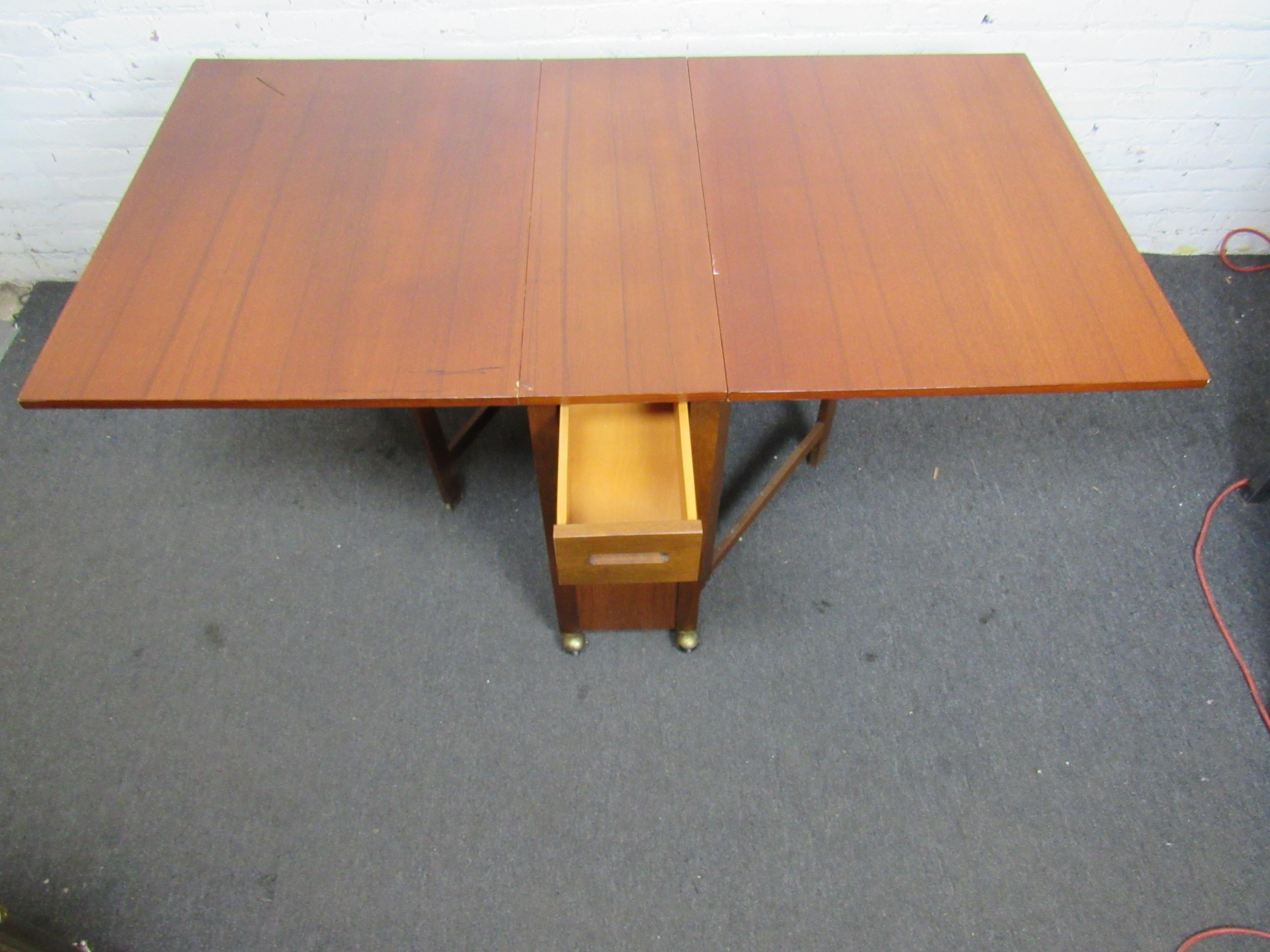 drop leaf table with chairs inside