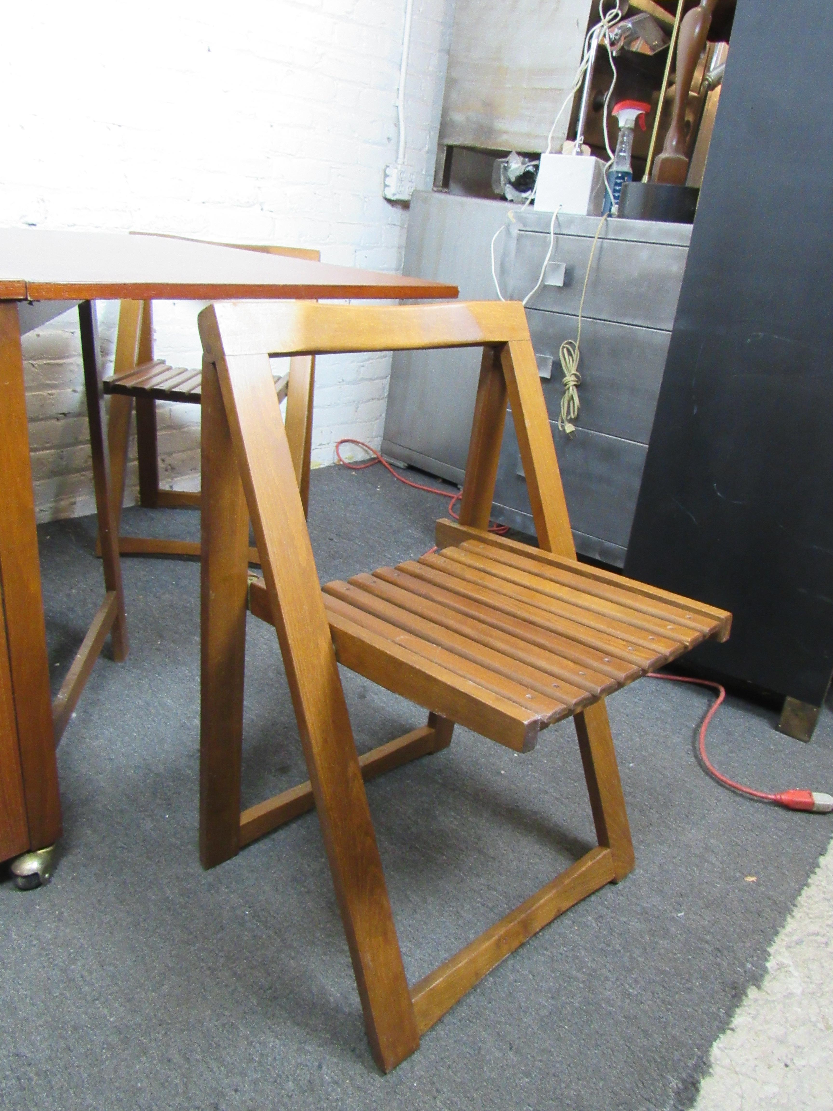 folding table with chairs inside