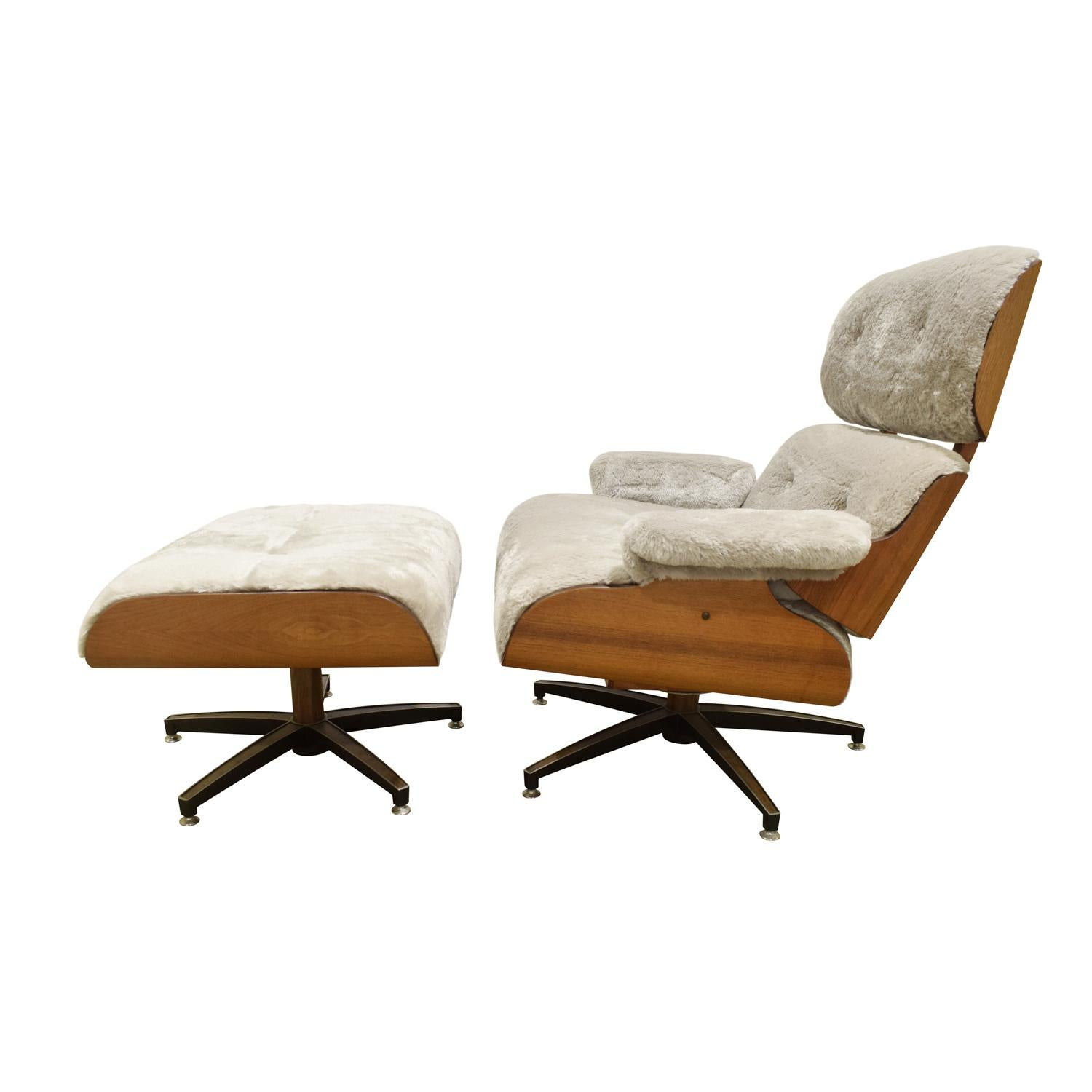 Eames style chair and ottoman in teak and steel with seat and back newly upholstered in faux fur, Denmark, 1970s. A very cool Scandinavian interpretation of an American Classic.

Ottoman dimensions:
W 26 inches
D 21.5 inches
H 16.5 inches.