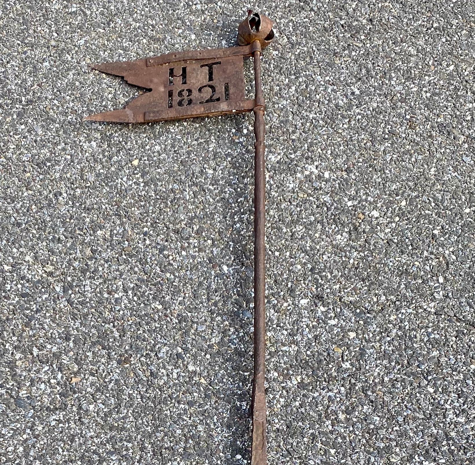 Danish early 19th century iron weather-vane with rose finial, dated 1821.