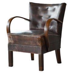 Danish Early Midcentury or Art Deco Low Lounge Chair in Worn Leather, 1940s 