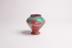Danish earthenware vase decorated with green and red luster glaze