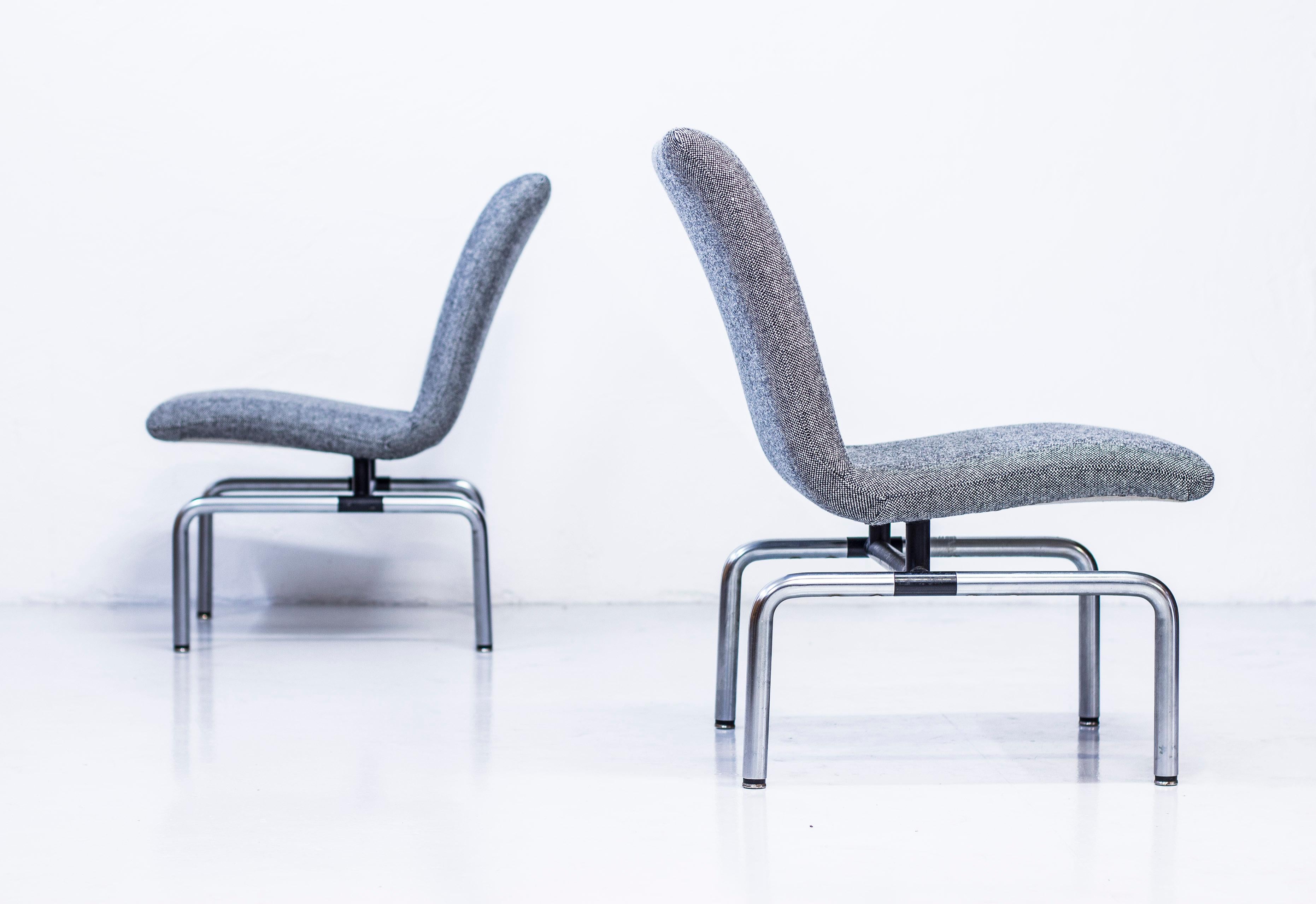 Easy chairs designed by Bondo Gravesen. Produced by his own company in Denmark during the 1970s. Made from chromed and black lacquered steel. Reupholstered in Hallingdal 65 wool fabric from Kvadrat. Very good condition with slight age related patina