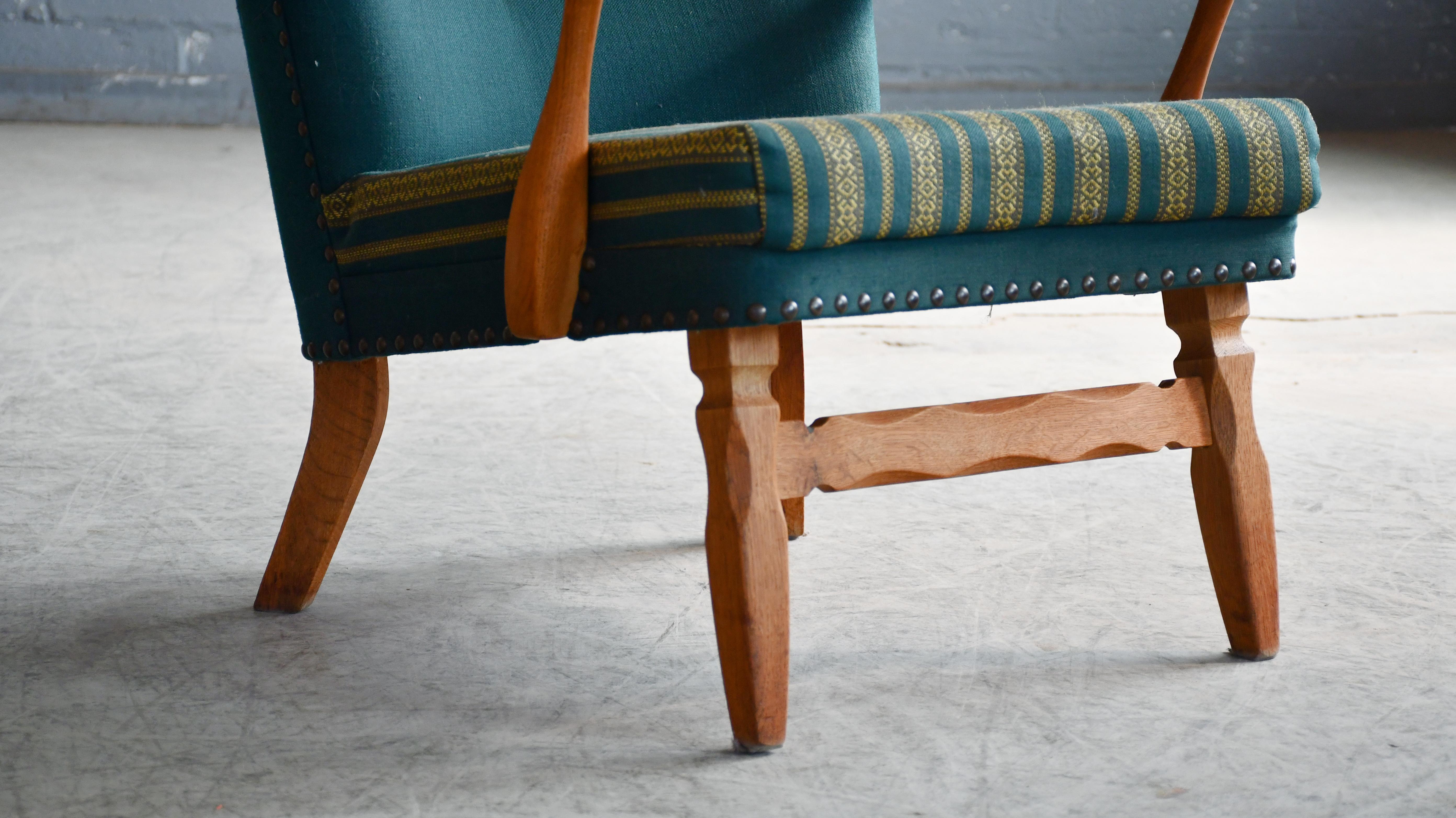 Danish Easy with Carved Oak Base and Armrests attributed to Henning Kjærnulf In Good Condition For Sale In Bridgeport, CT