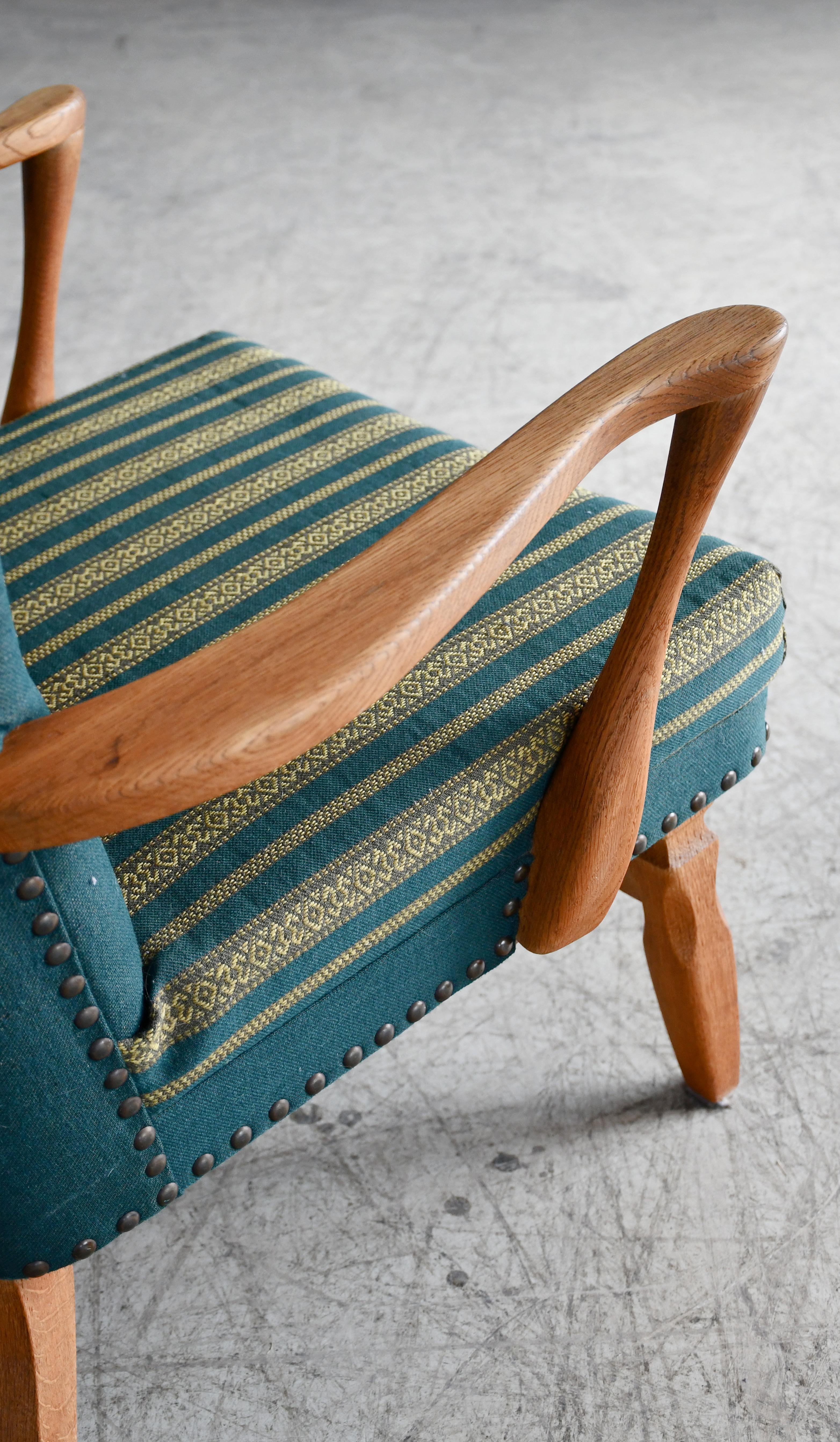 Wool Danish Easy with Carved Oak Base and Armrests attributed to Henning Kjærnulf For Sale
