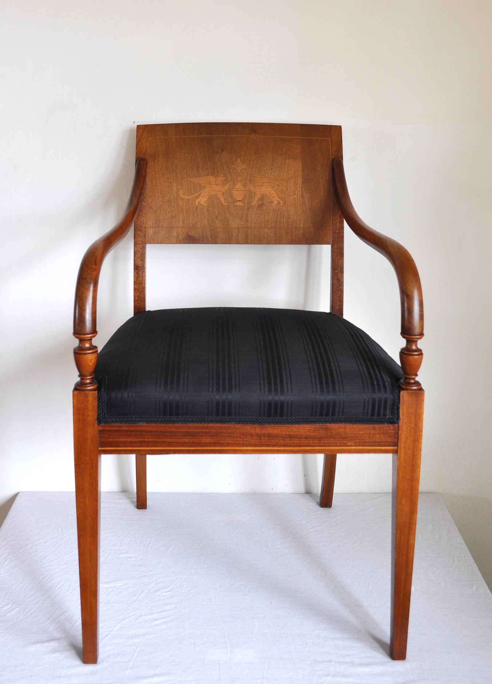 Elegant classic Danish Empire armchair in mahogany with inlays of two Griffins made of birch. New upholstery with Horsehair fabric woven by British John Boyd Textiles Ltd. Early 19th century.

Excellent condition, with minor signs of