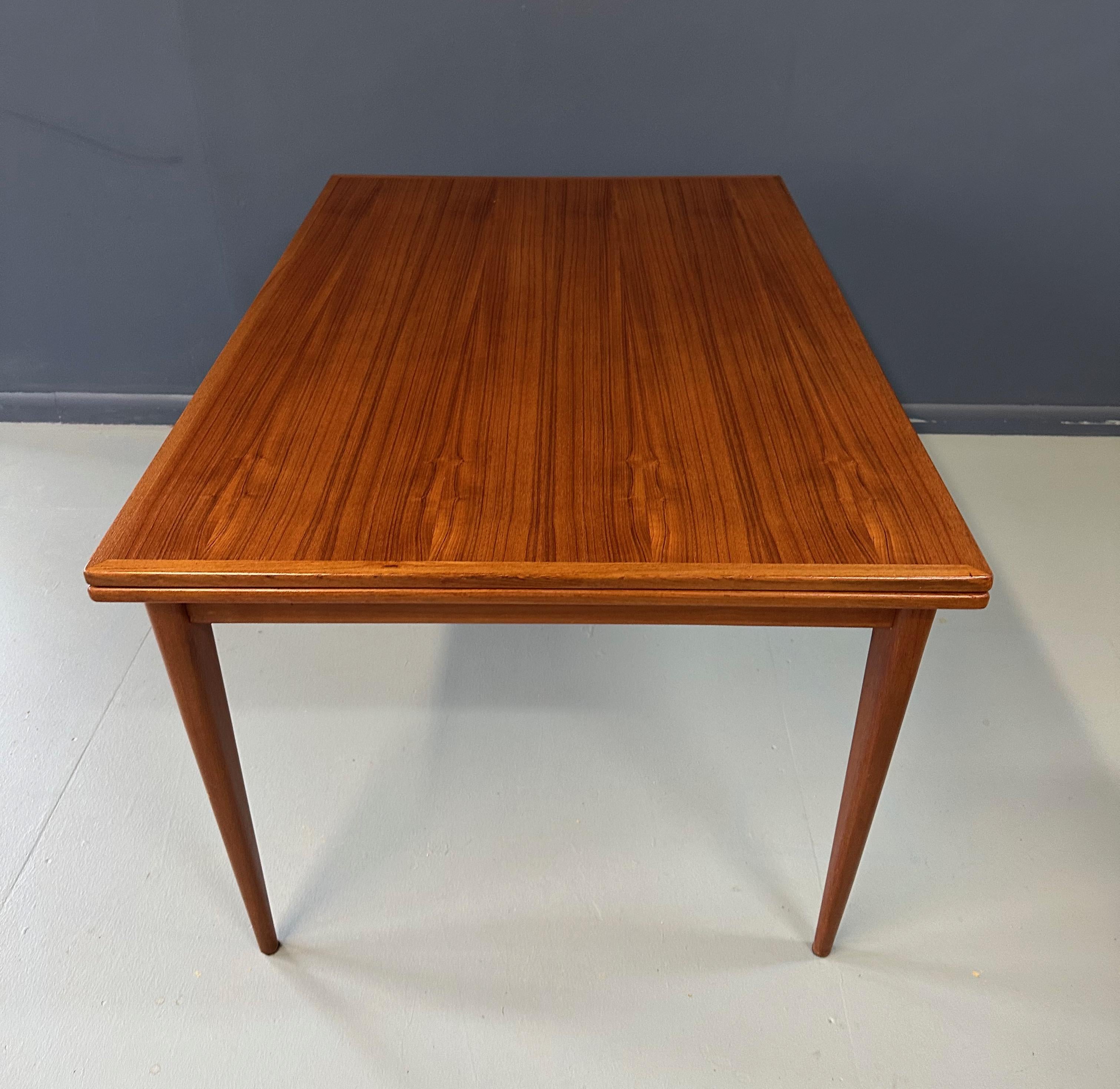 European Danish Extendable Dining Table in Teak by Niels O. Møller for J.L. Møller For Sale