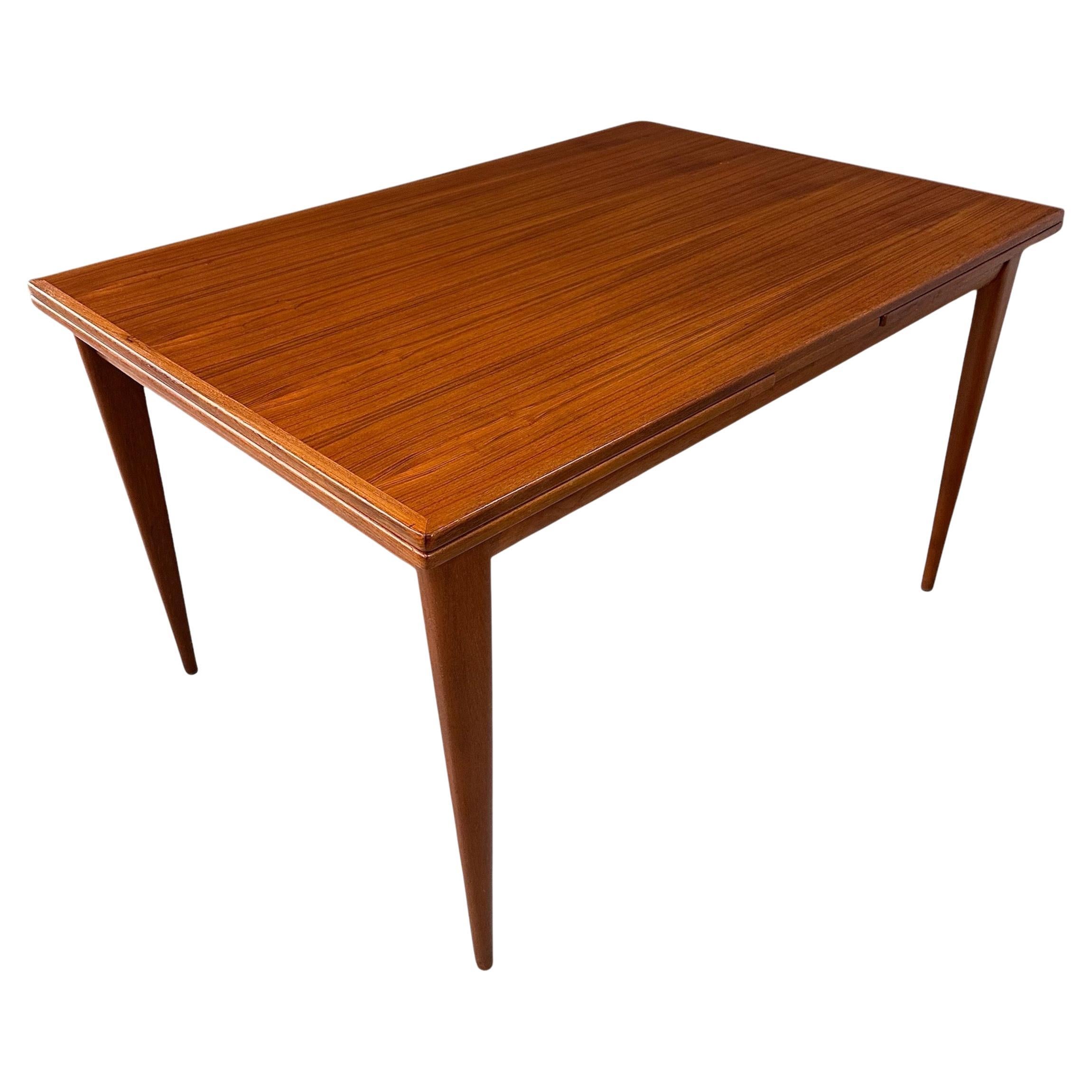 Danish Extendable Dining Table in Teak by Niels O. Møller for J.L. Møller