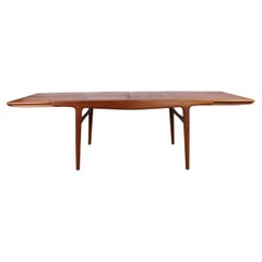 Danish extendable dining table in teak model 217 by Arne Hovmand Olsen 1960.