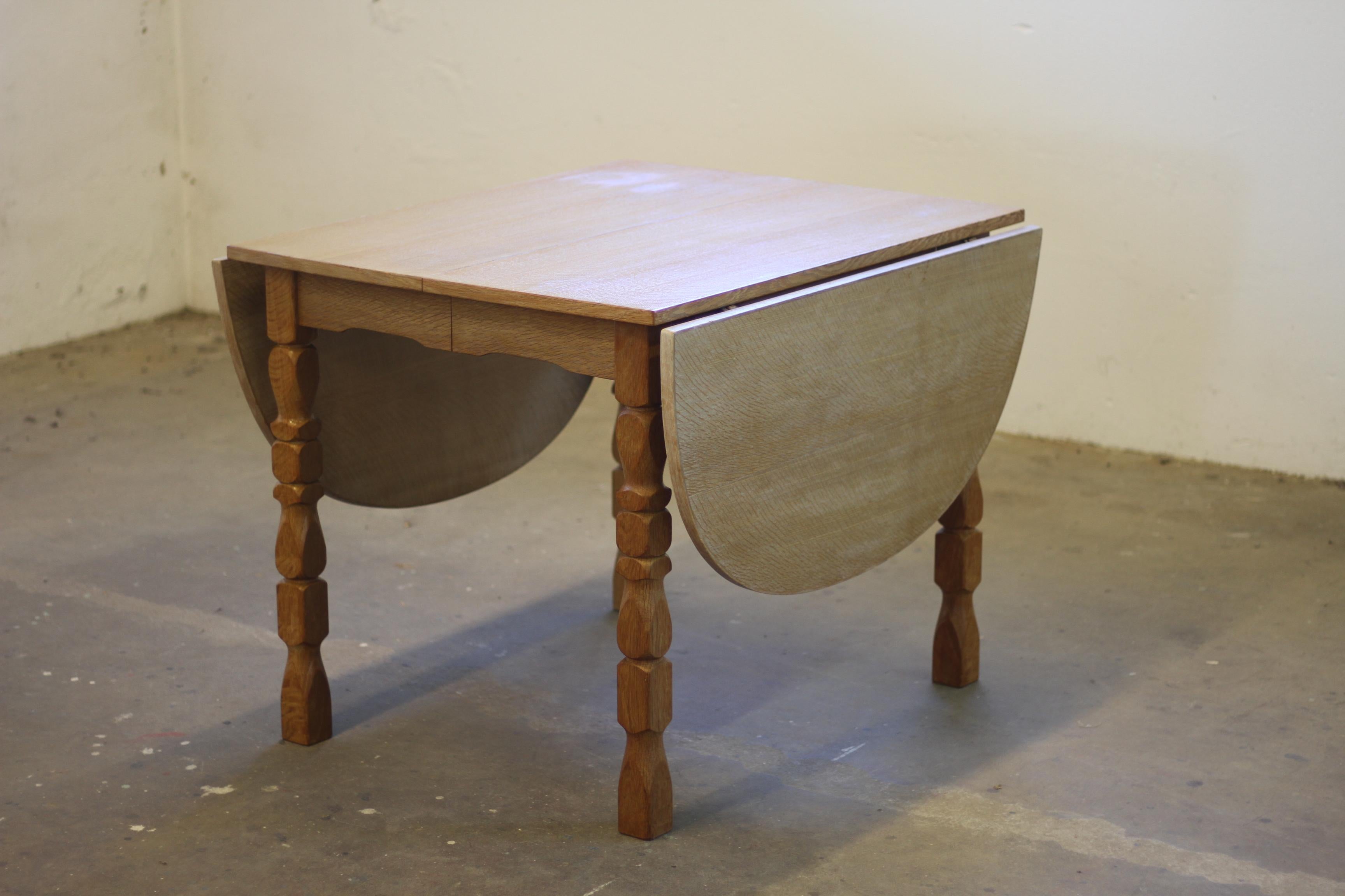 Danish Extendable Dining Table with leafs in Oak style of Henning Kjærnulf, 1960 For Sale 7