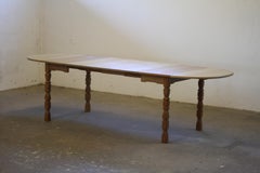 Danish Extendable Dining Table with leafs in Oak style of Henning Kjærnulf, 1960