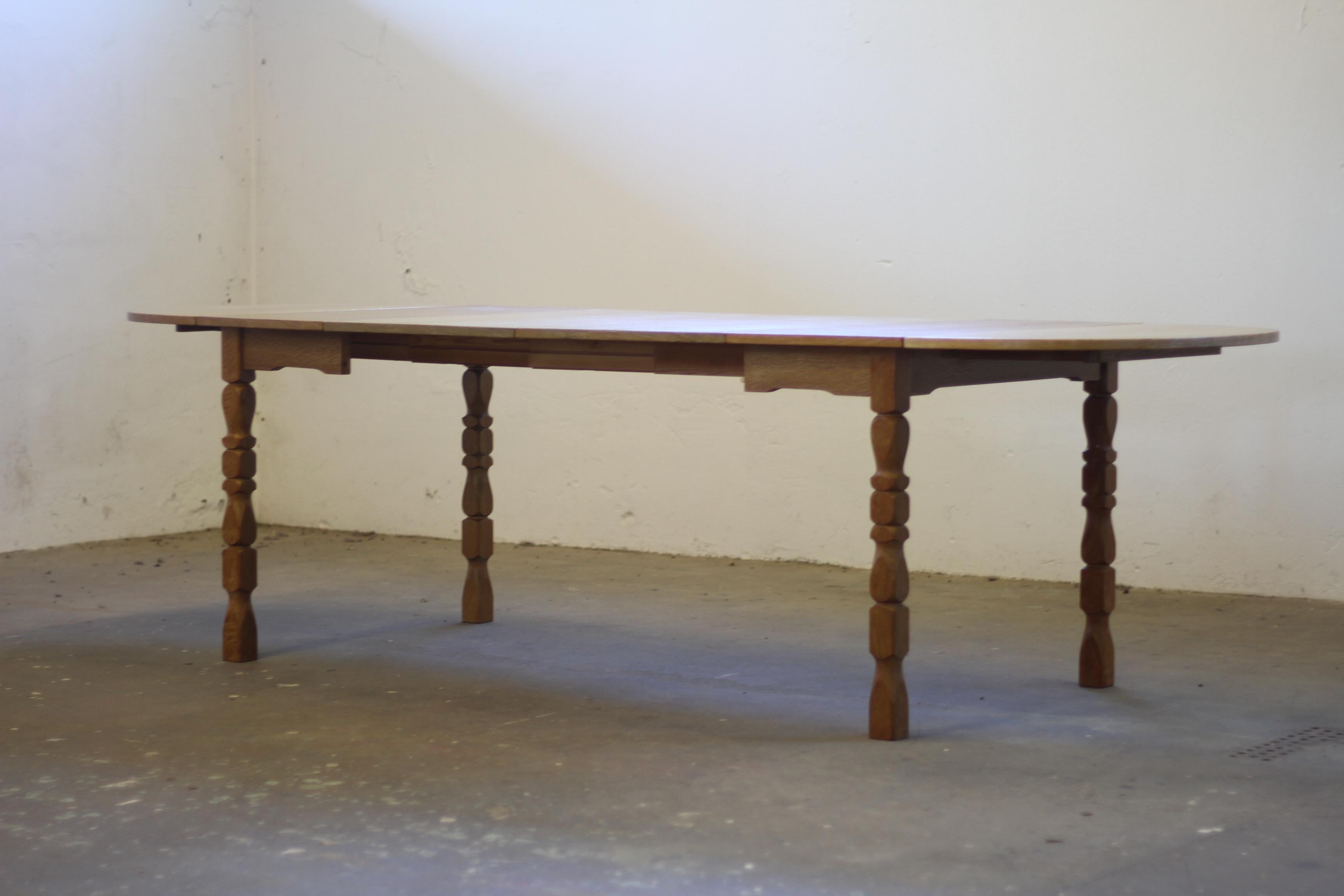 Danish Extendable Dining Table with leafs in Oak style of Henning Kjærnulf, 1960 For Sale 3