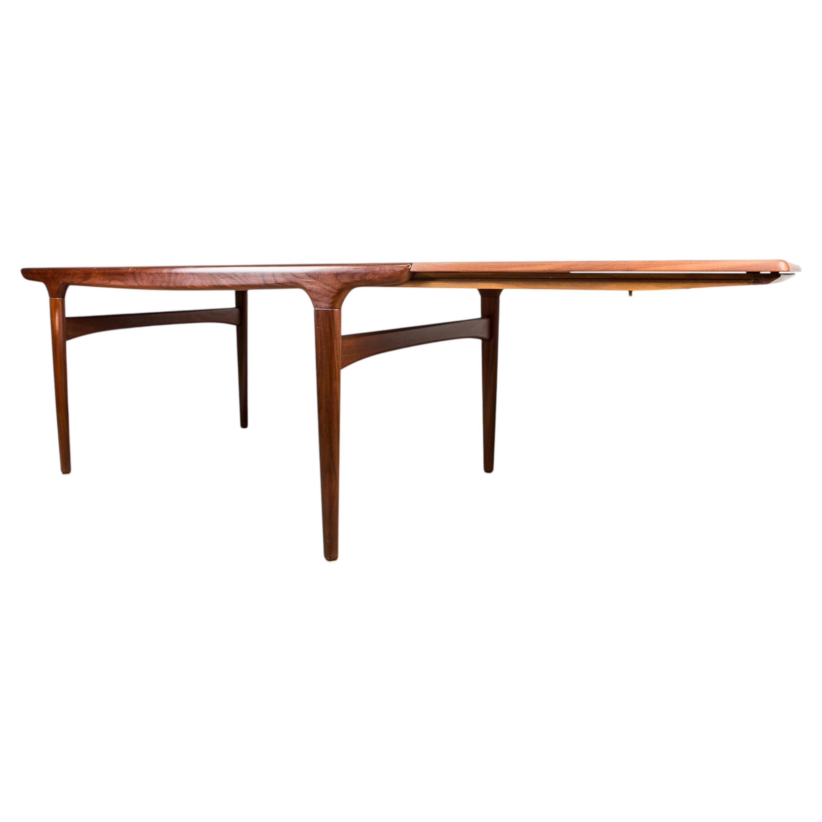 Danish extendable teak dining table, 1960, by Johannes Andersen for Uldum 1960. For Sale