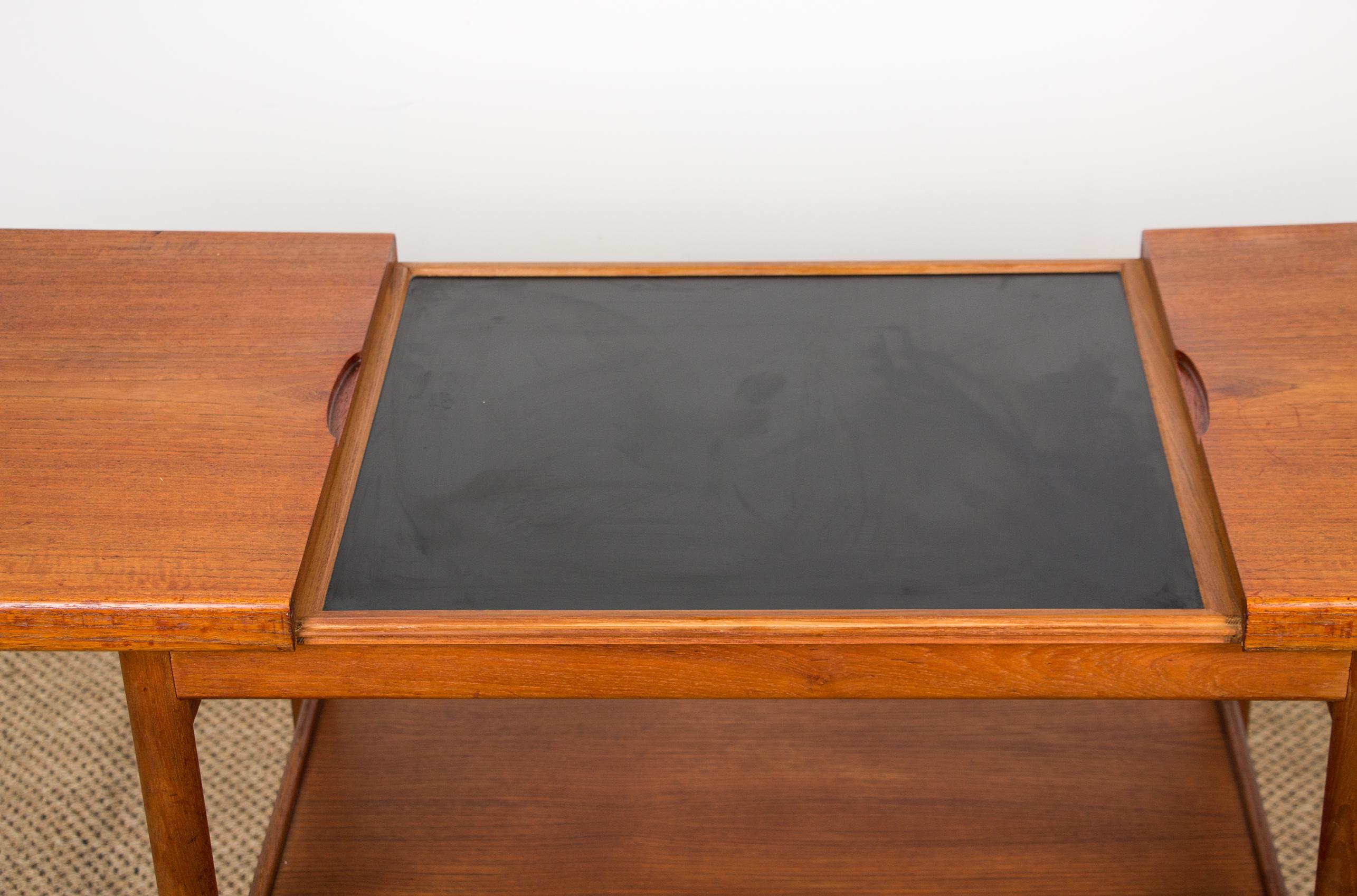 Danish extendable two-tier teak serving table 1960 by Kurt Ostervig 1960. For Sale 1