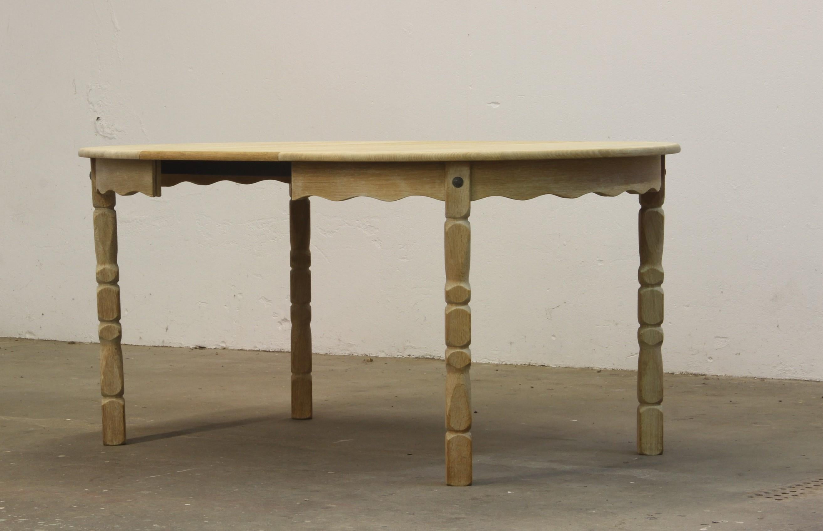 Danish Extending Dining Table in Light Raw Oak by Henning Kjærnulf 9