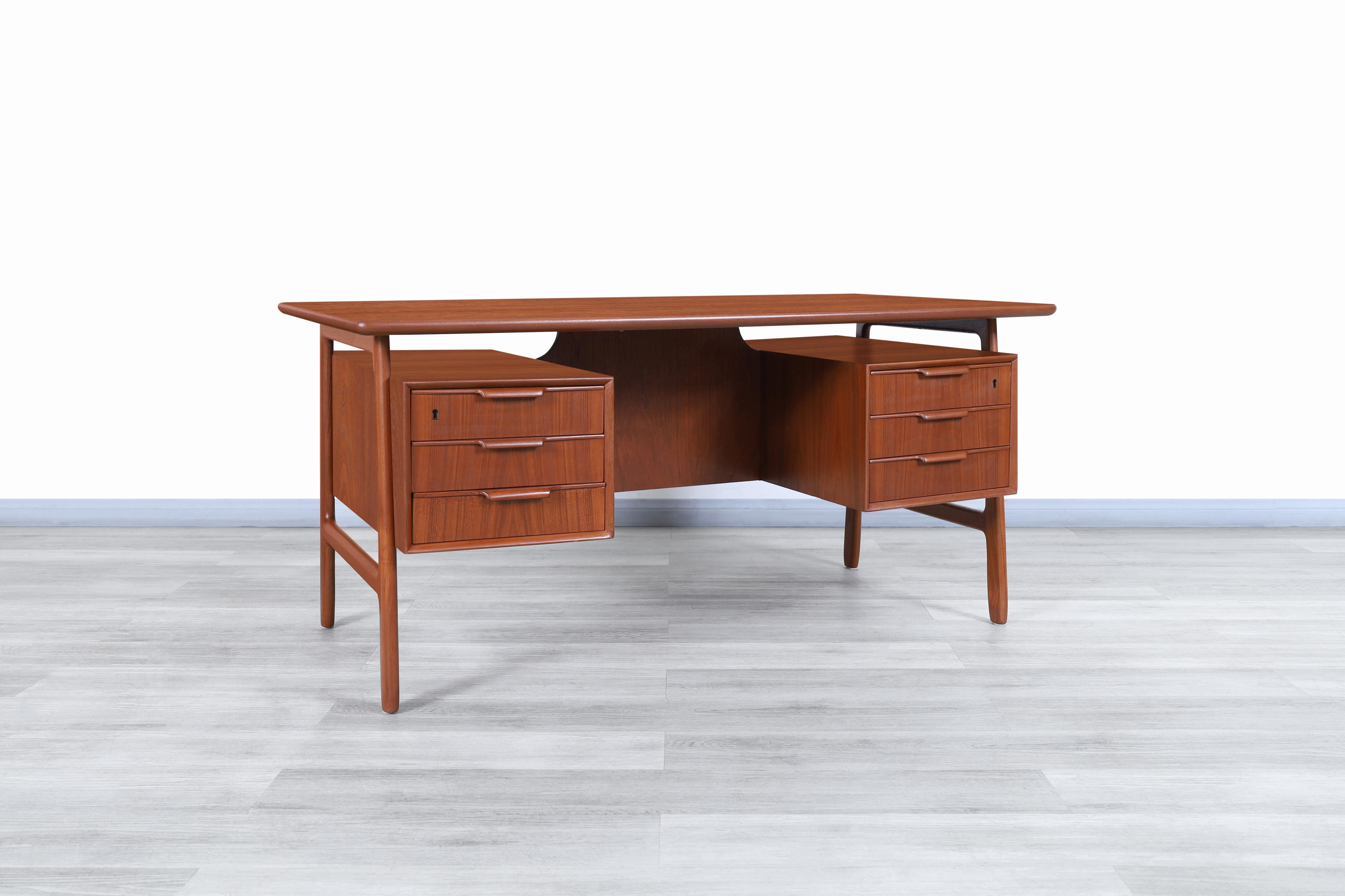 Danish Floating Top Teak Desk Model #75 by Gunni Omann In Excellent Condition In North Hollywood, CA