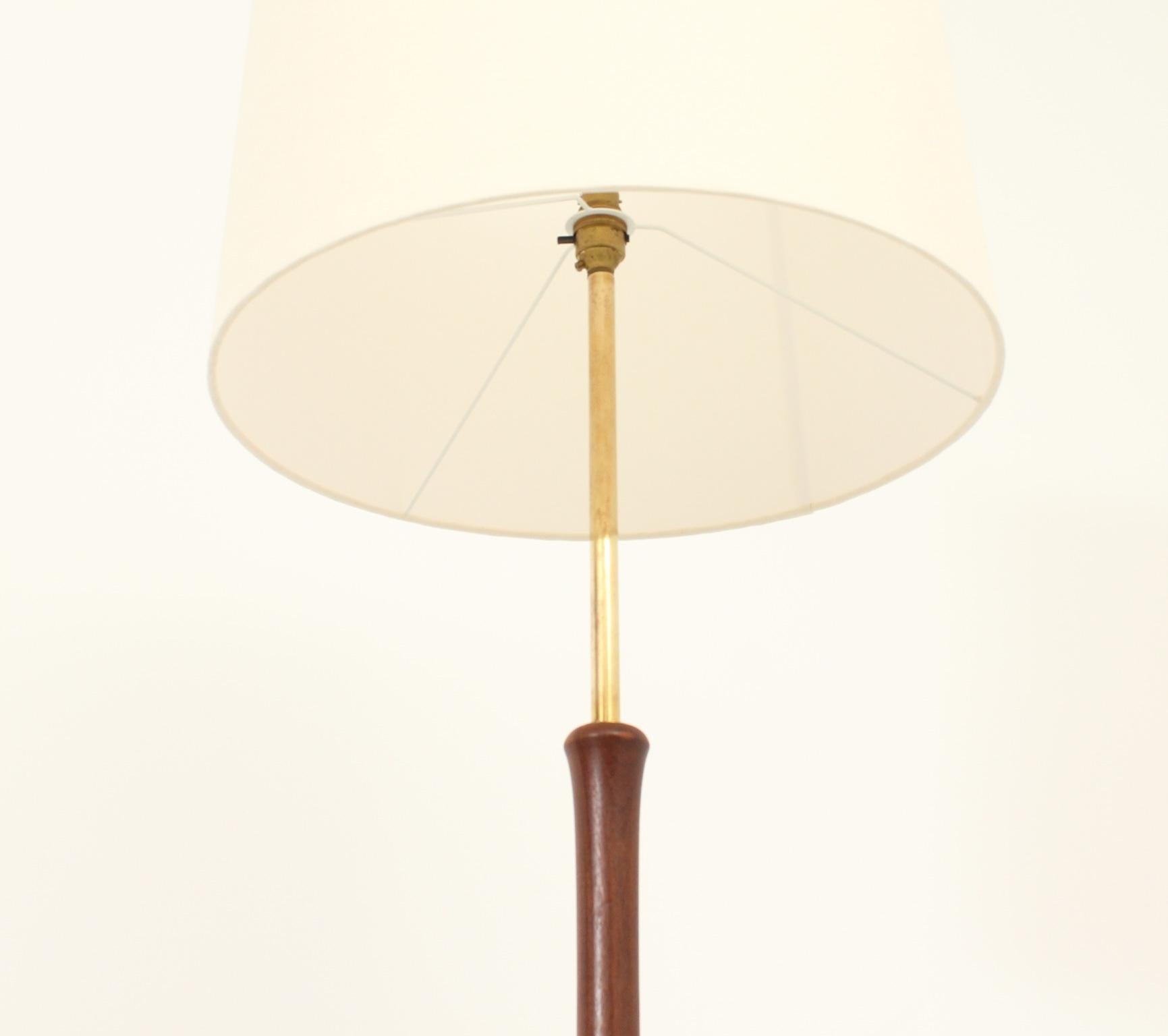 wood and brass floor lamp