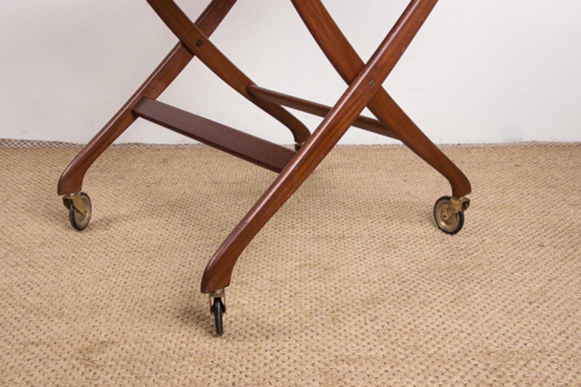 Teak Danish folding teak rolling table by Svend Aage Madsen for Illums Bolhigus 1960. For Sale