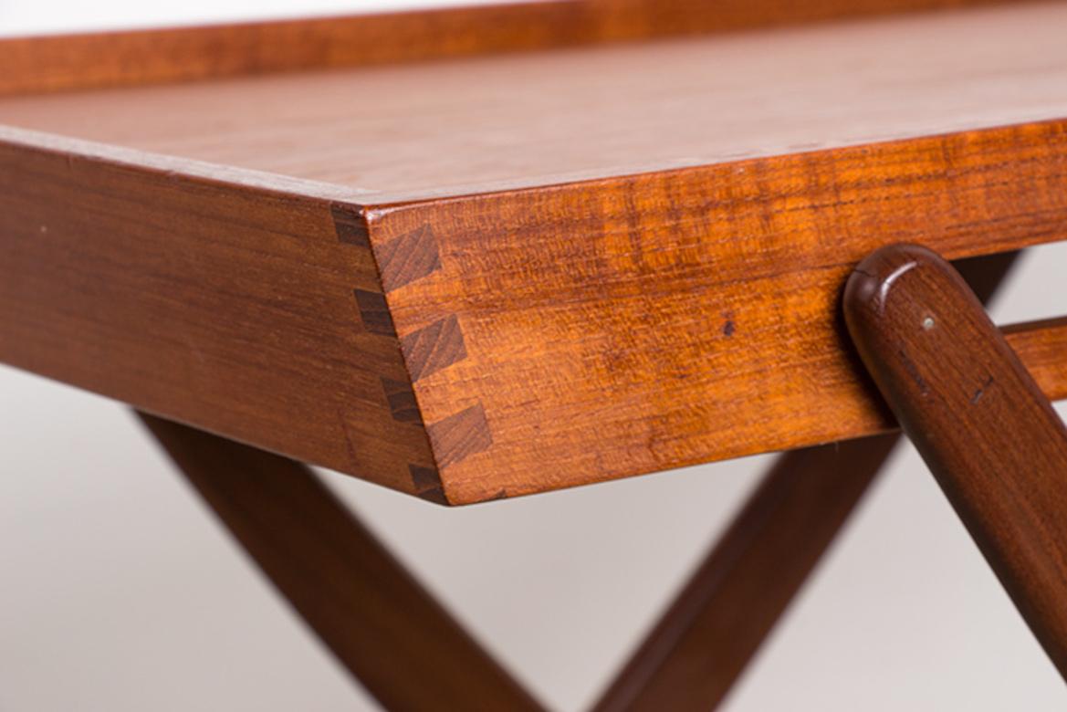 Danish folding teak rolling table by Svend Aage Madsen for Illums Bolhigus 1960. For Sale 1