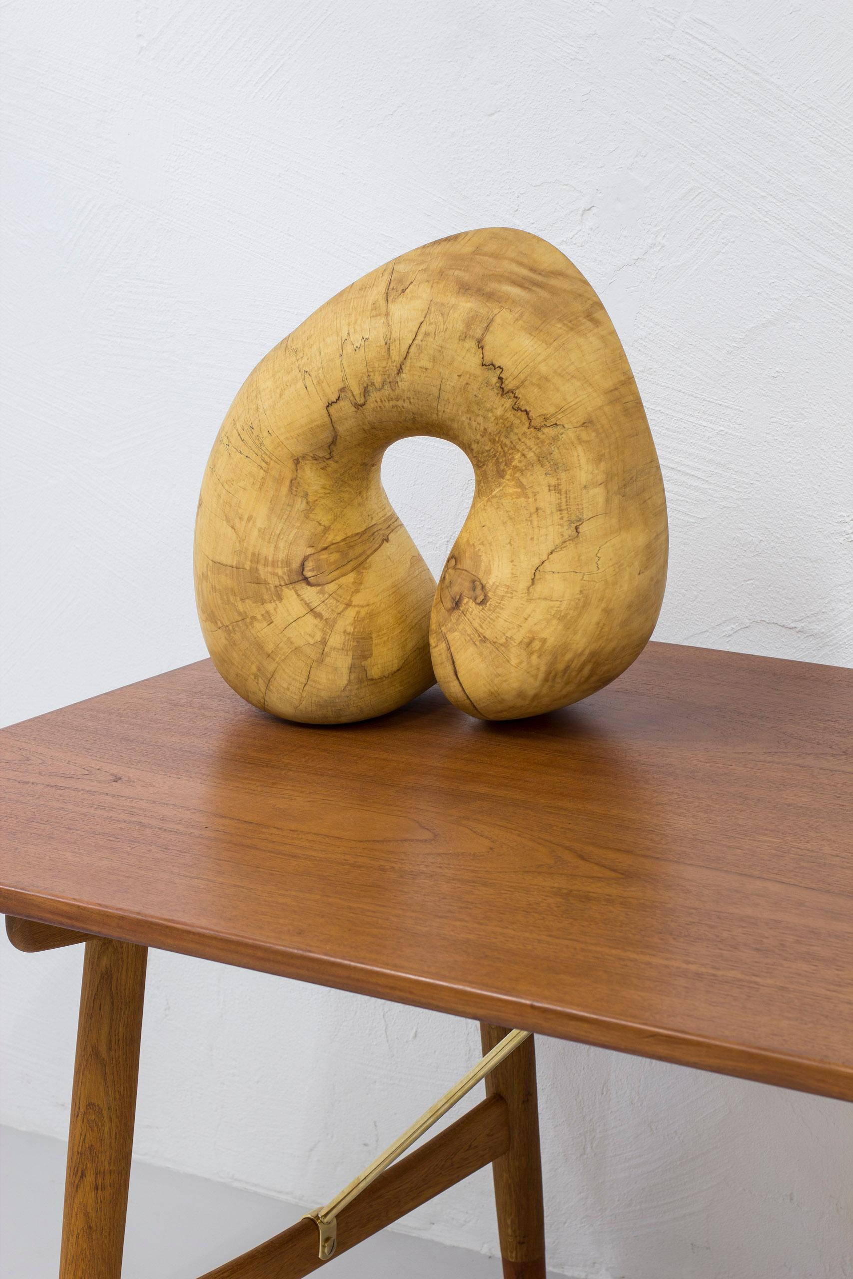 Large organic free form wood sculpture made by hand in Denmark during the 1950-60s. Made by Danish wood carver or sculptor from a solid piece of maple. Heavy and highly expressive. Unique. Very good condition with few signs of age related wear and