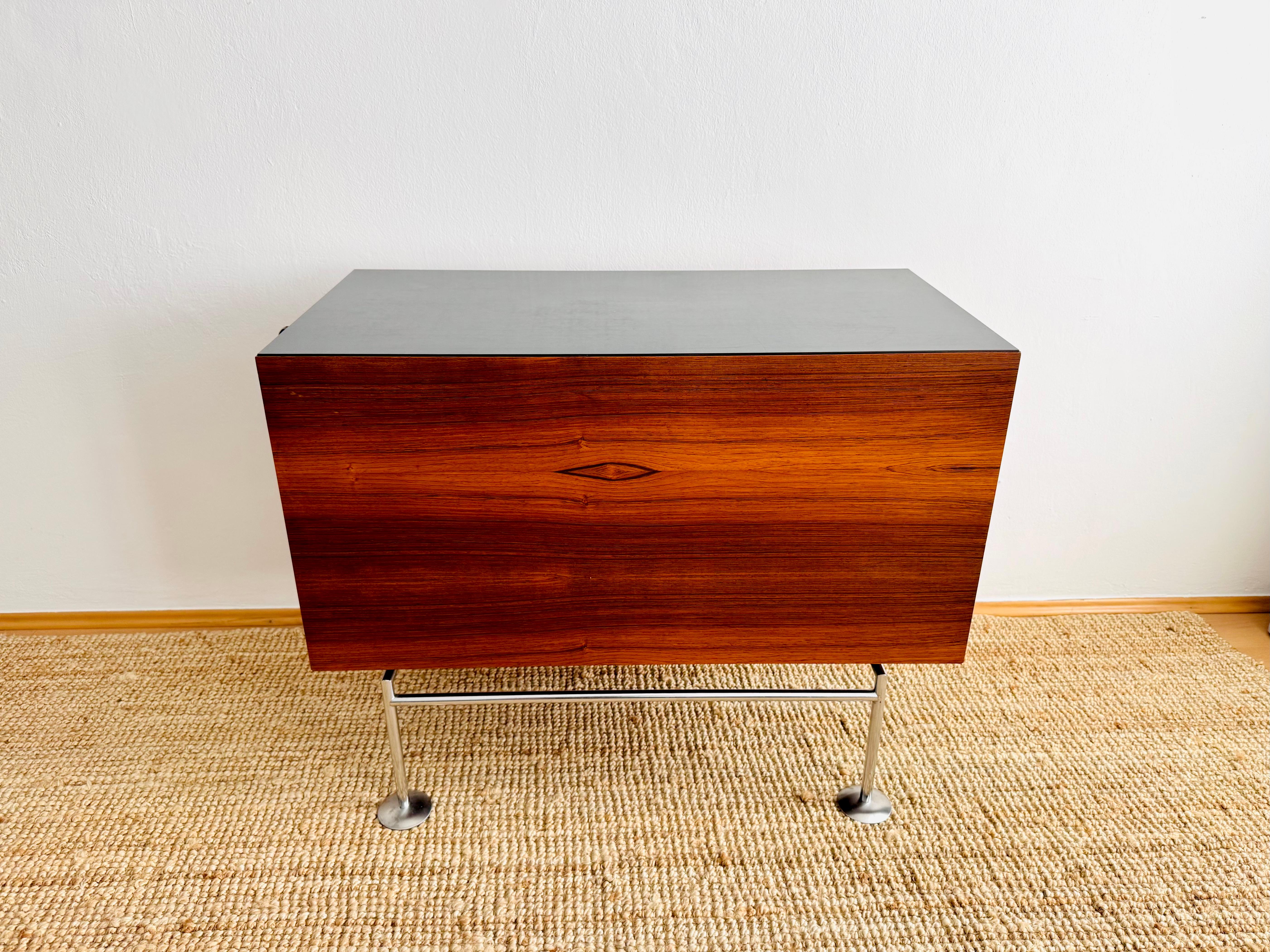 Exceptionally beautiful Danish freestanding bar furniture from the 1960s.
The high-quality craftsmanship and elegant design make this piece of furniture a true favorite.
A very special piece of furniture that will bring you joy every day.
The top
