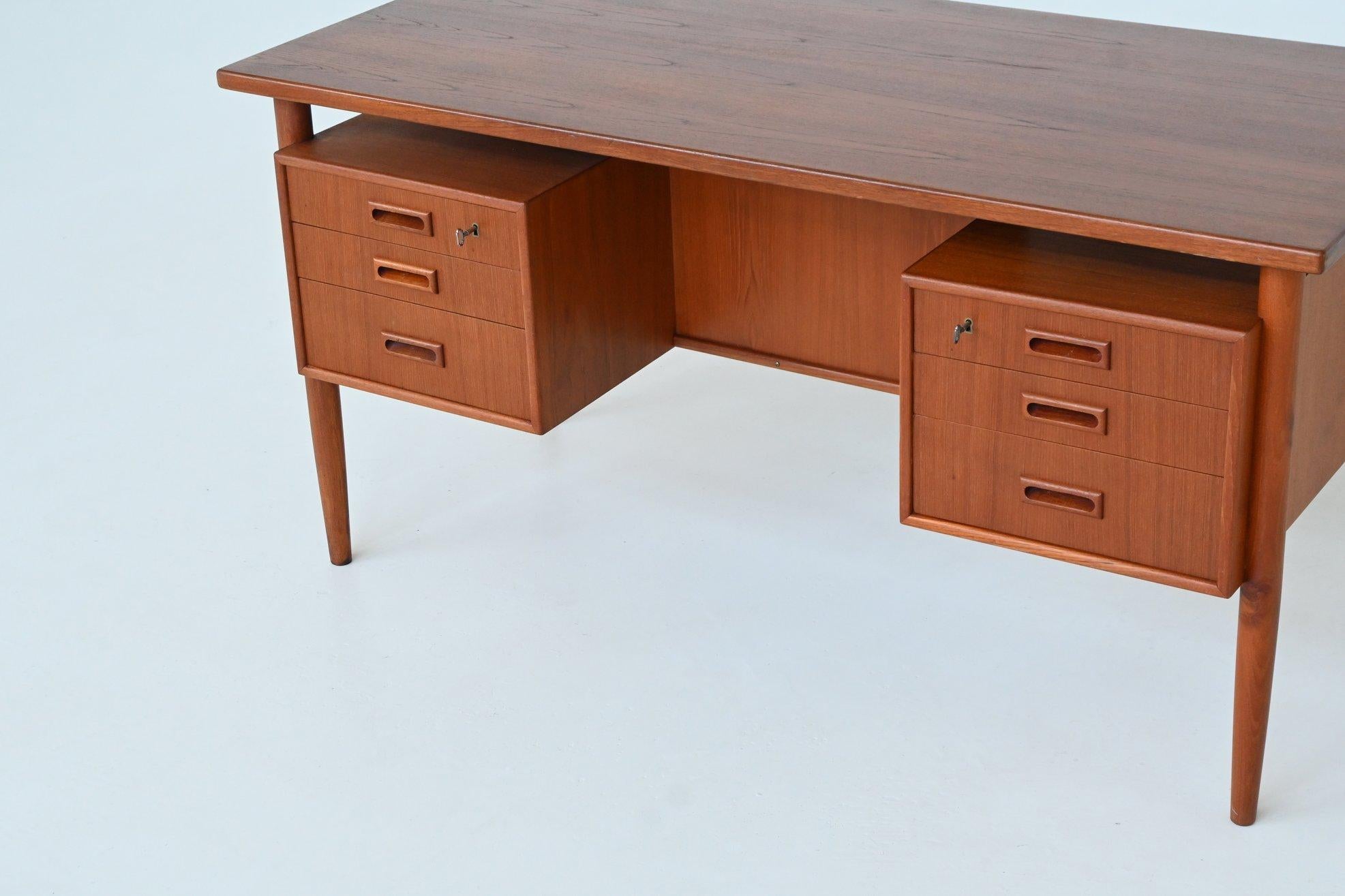 Mid-20th Century Danish freestanding symmetric desk in teak Denmark 1960 For Sale