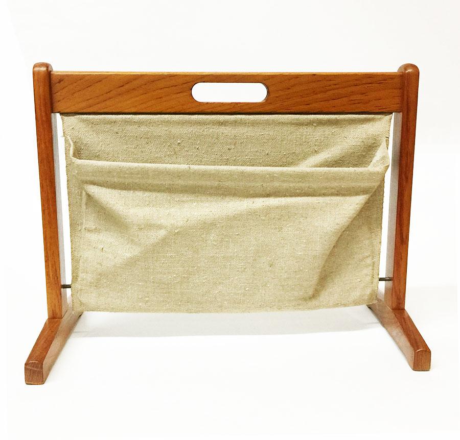 Danish Furbo teak magazine rack, 1960s

BRDR. Furbo magazine rack, Spottrup, Denmark
2 compartments of canvas fabric hanging in a teak standing frame

Measurements are 42 cm high and 54 cm wide
The depth is 29 cm
Approximate 1700 gram weight.