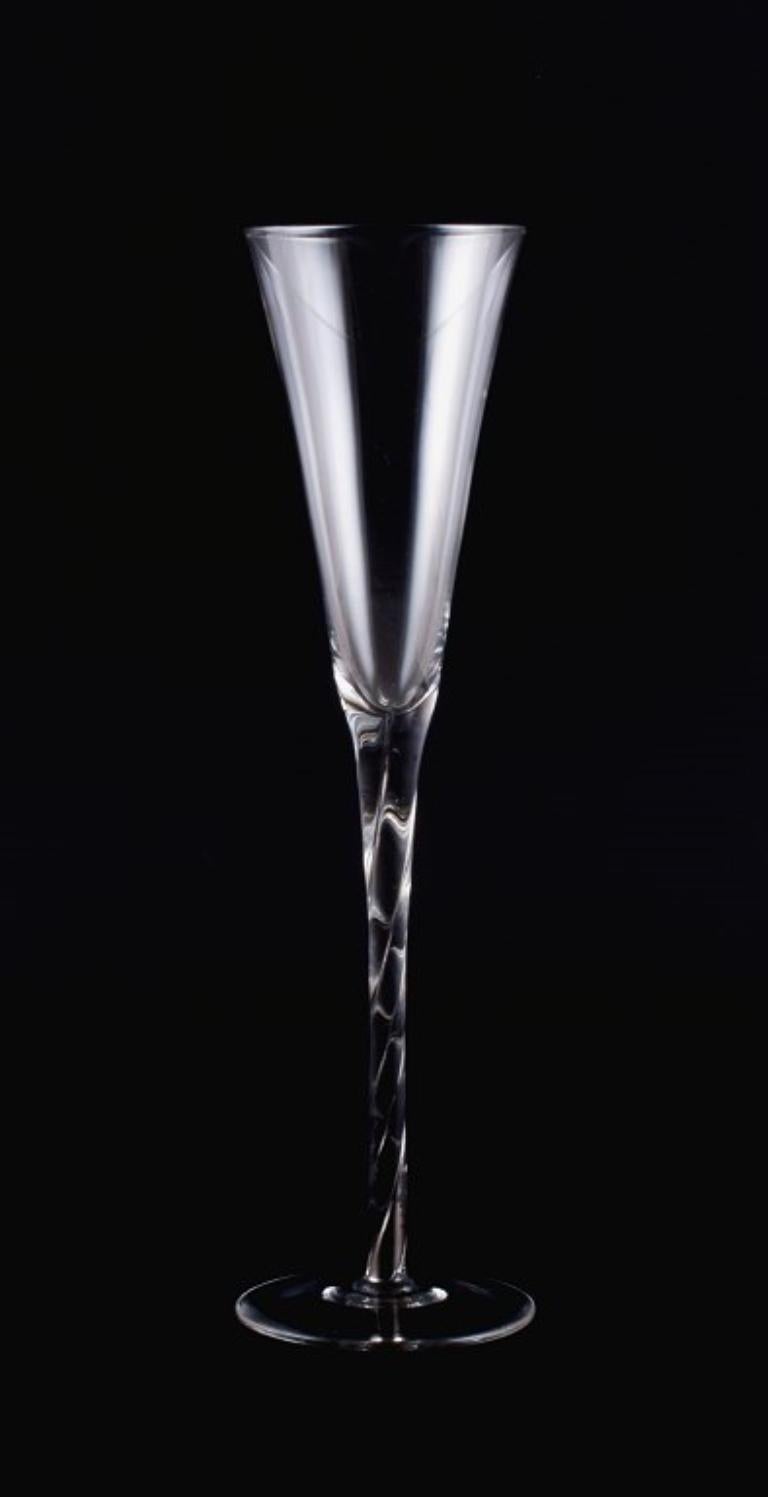 Danish glass artist, two champagne flutes in art glass covered with silver inlays in the stem.
Handmade.
Late 20th C.
Perfect condition.
Dimensions: H 28.5 x D 7.3 cm.