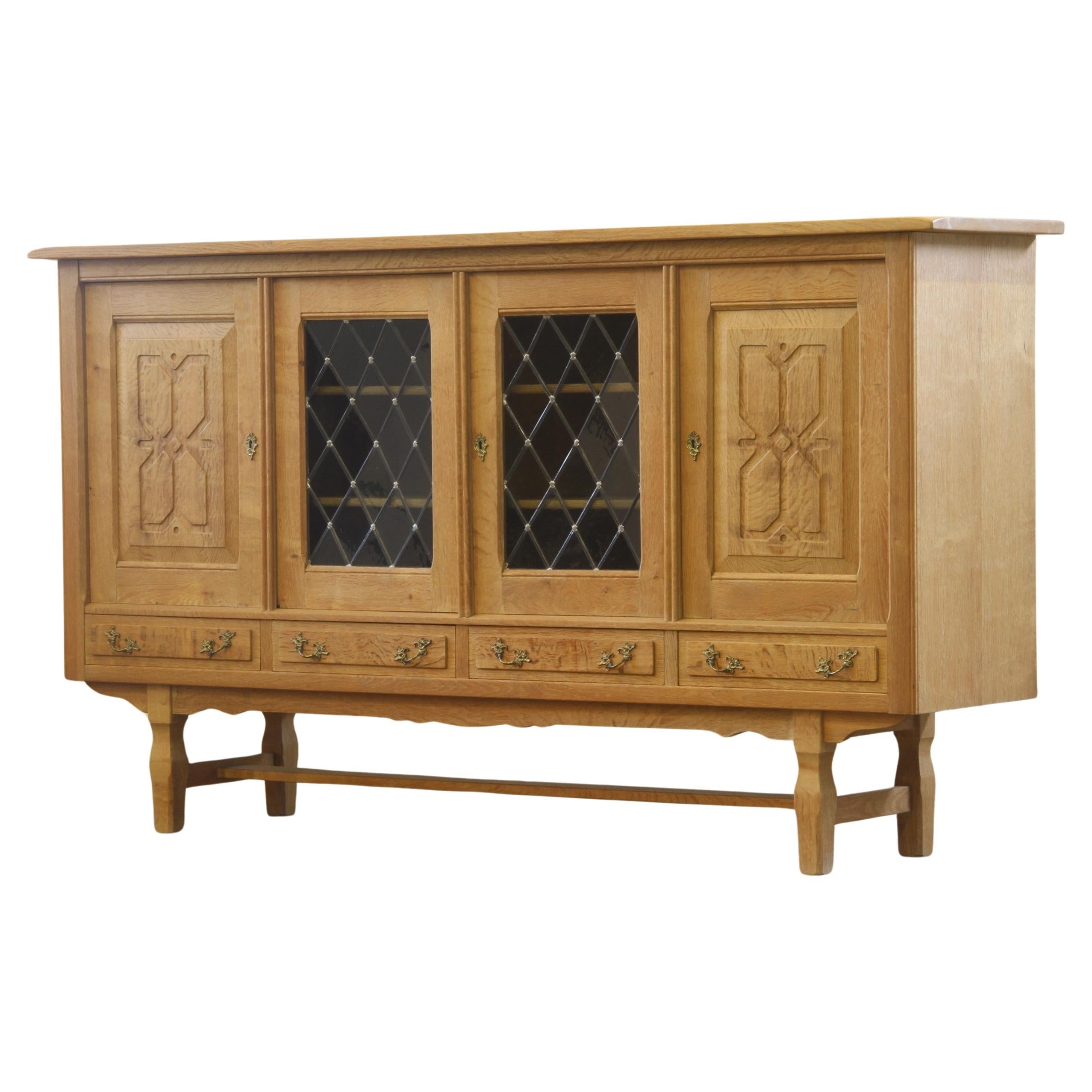 Danish Glass Oak High Sideboard attributed to Henning Henry Kjaernulf, Denmark For Sale