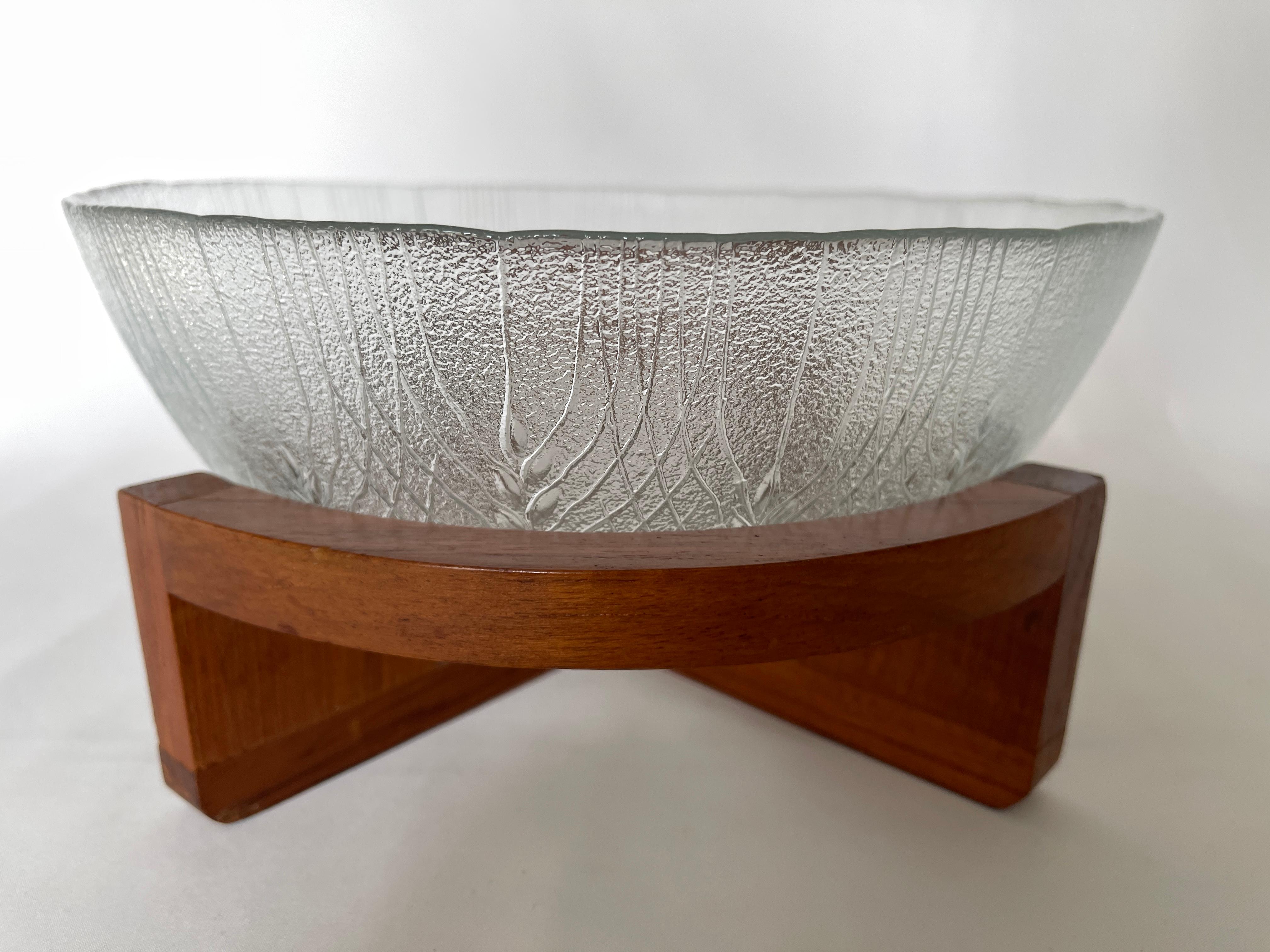 1960's Danish Modern opaque pressed glass bowl with curved teak wood stand. Glass bowl measures 10