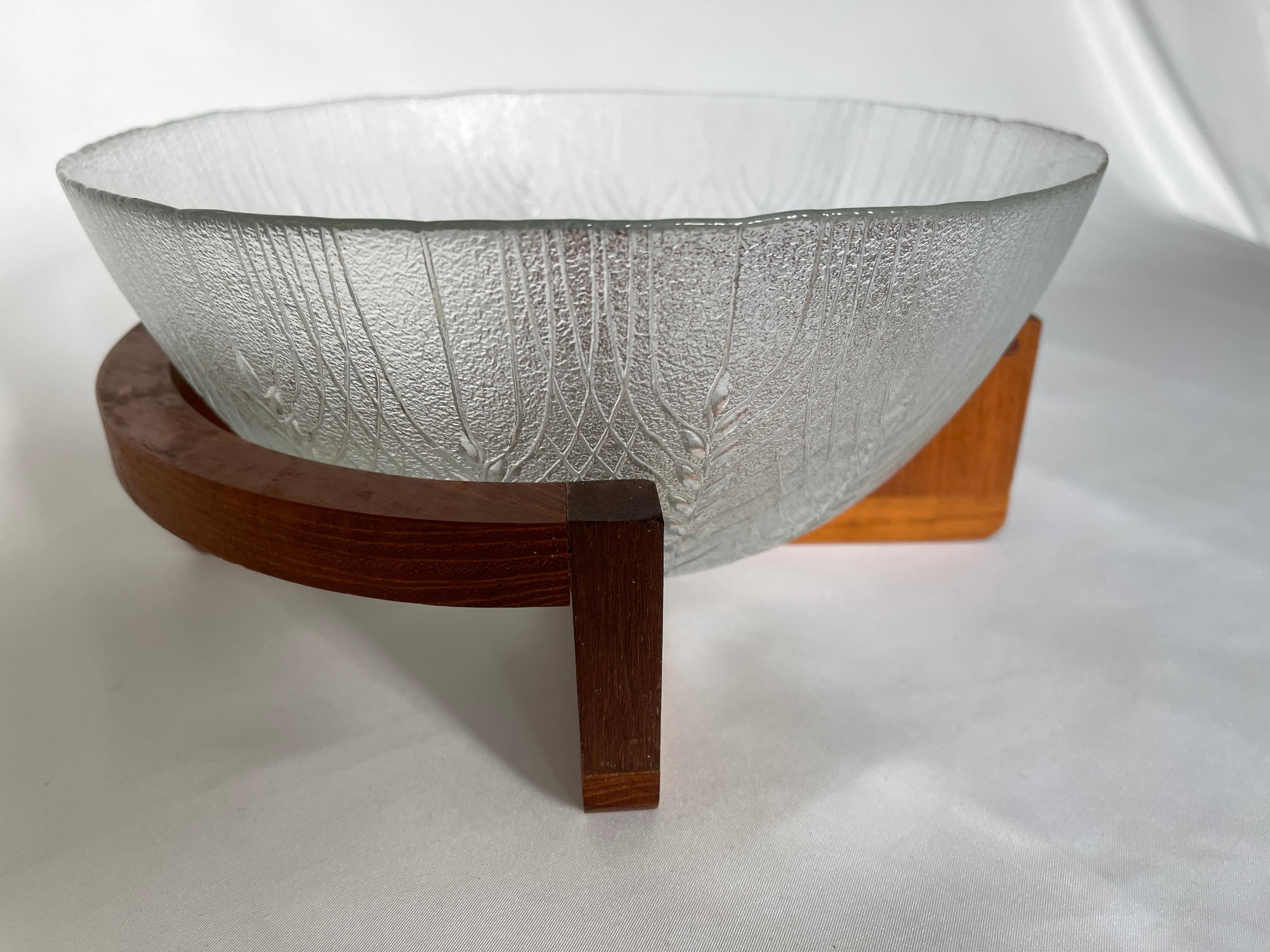 glass salad bowl with wooden stand