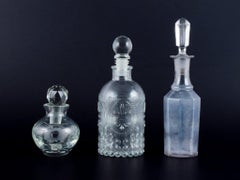 Danish glassworks, three oil/vinegar jugs in different designs. 1930/40s