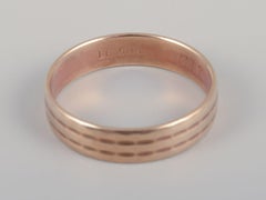 Danish goldsmith. 14 karat gold alliance ring. Classic and minimalist design.