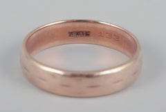 Danish goldsmith. 14-karat gold alliance ring.