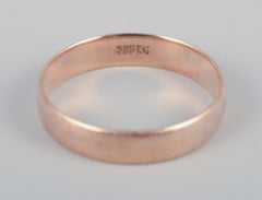 Danish goldsmith. 14-karat gold alliance ring. Mid-20th C.