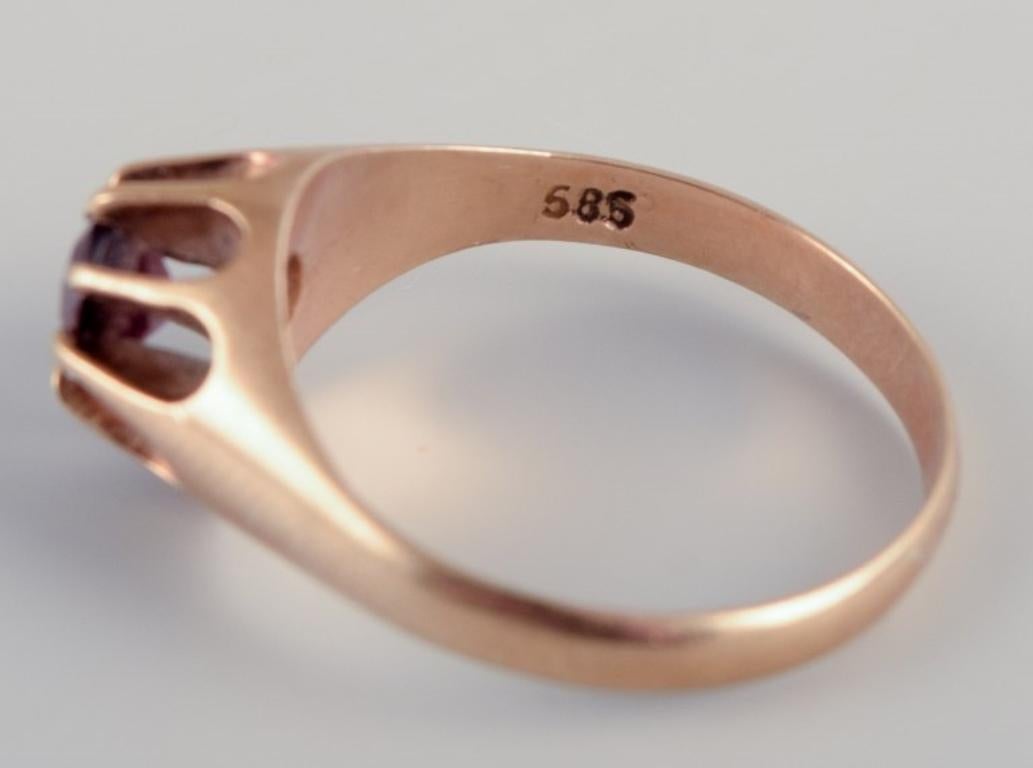 Women's Danish goldsmith. 14-karat gold ring with burgundy-colored semi-precious stone For Sale