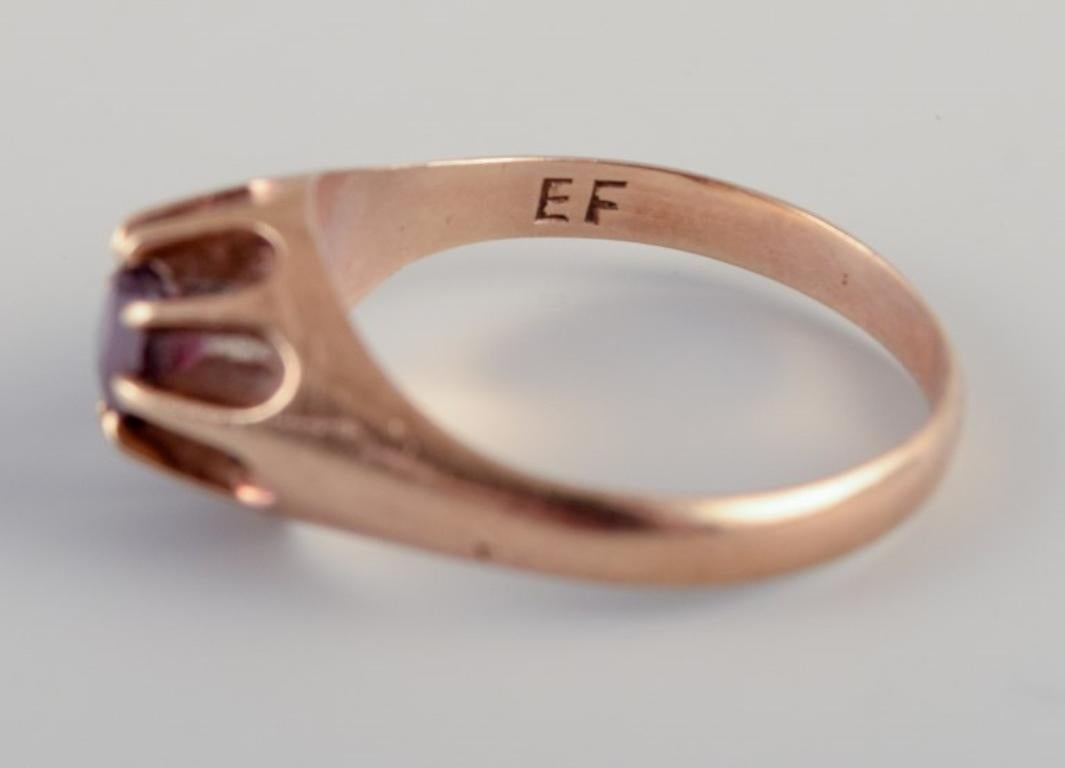 Danish goldsmith. 14-karat gold ring with burgundy-colored semi-precious stone For Sale 1