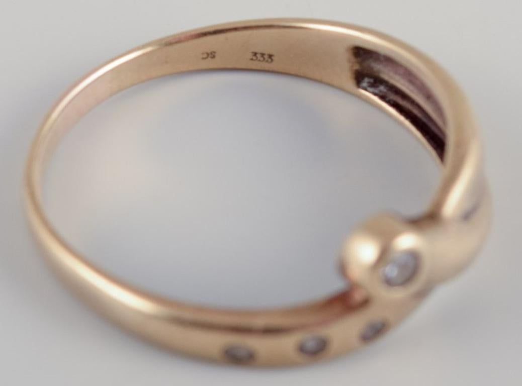 Orfèvre danois. Bague en or 8 carats. Orné de quatre diamants taillés en brillant. Pour femmes en vente
