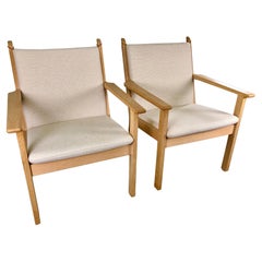 Danish Hans J. Wegner Set of Two Lounge Chairs in Oak and Fabric by GETAMA