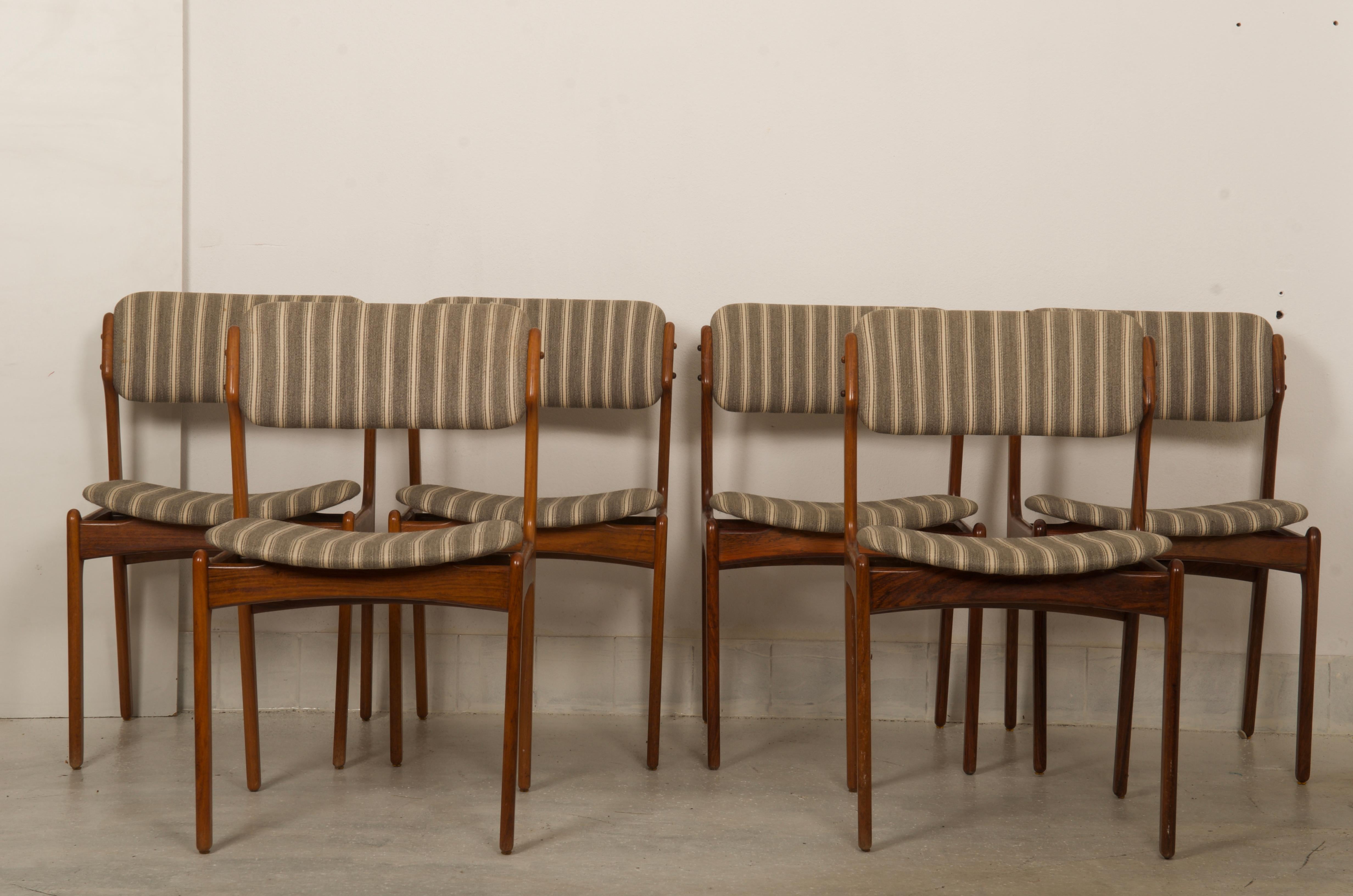 Set of six hardwood dining chairs designed by Erik Buck in the 1960s and produced by Oddense maskinsnedkeri A/S in Denmark.